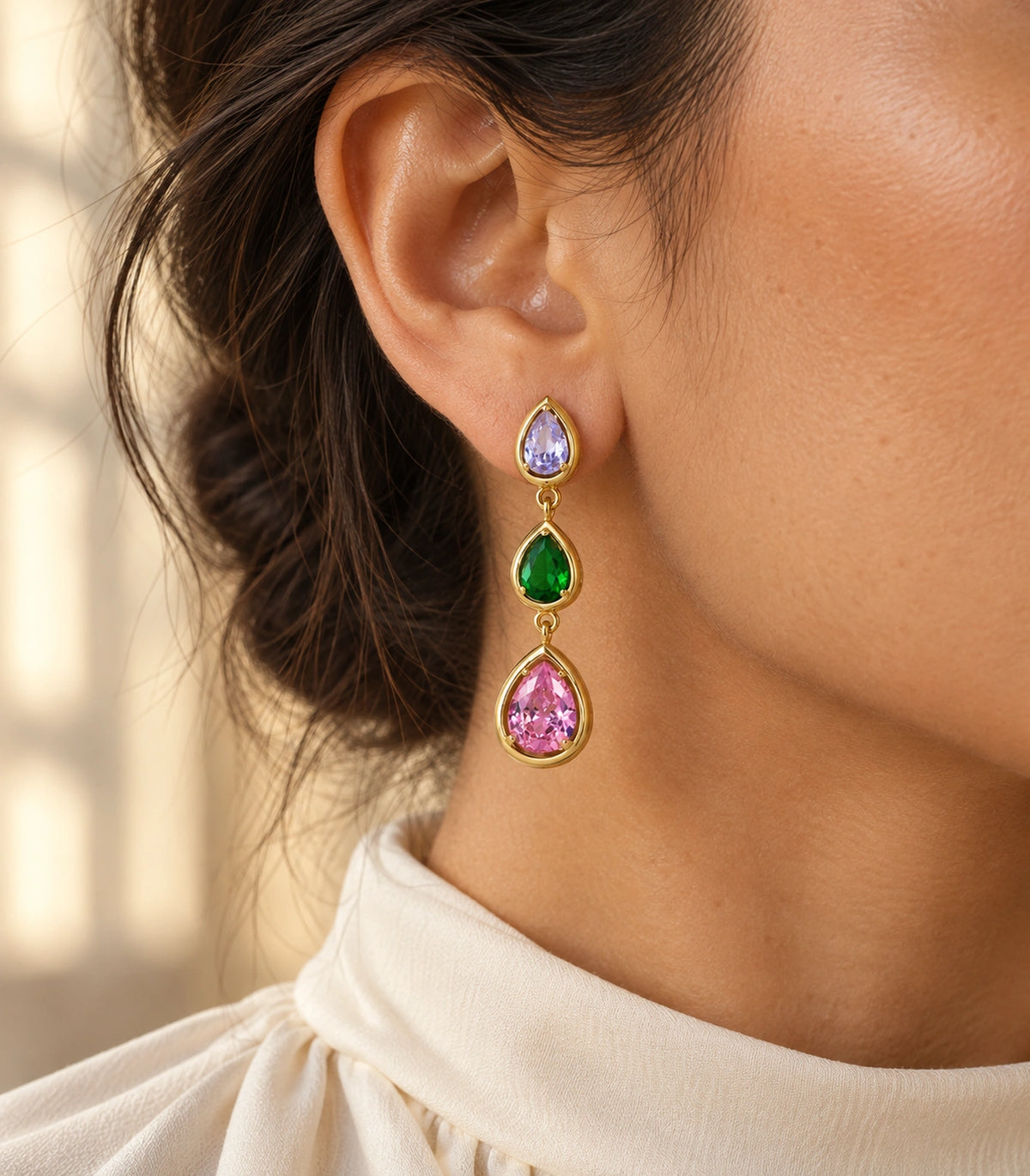 JIMIKI Gold Tone Lilac Green Pink Triple Teardrop Earring Pair in Gold tone / lilac, green, pink, editorial model view