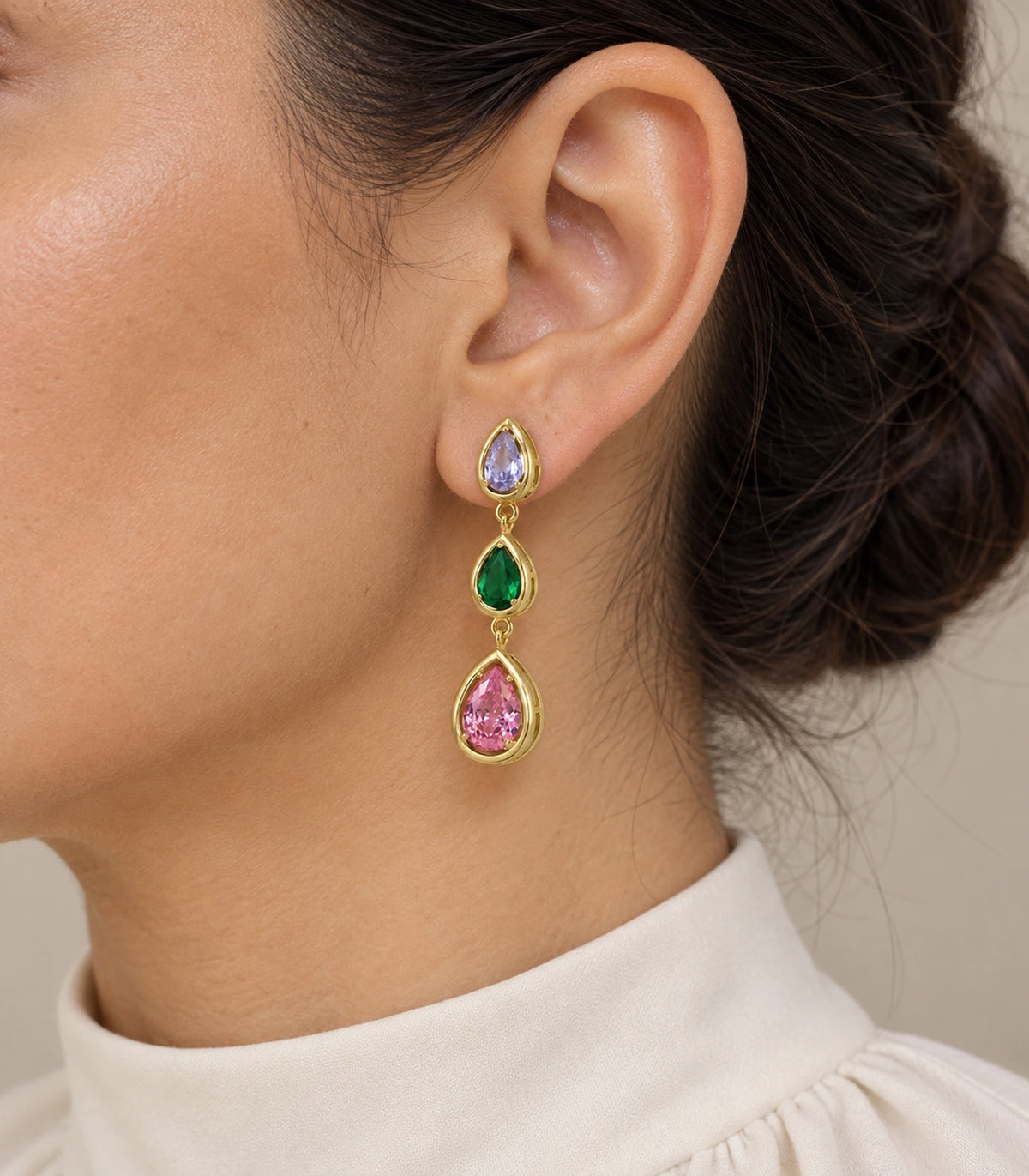 JIMIKI Gold Tone Lilac Green Pink Triple Teardrop Earring Pair in Gold tone / lilac, green, pink, model wearing view