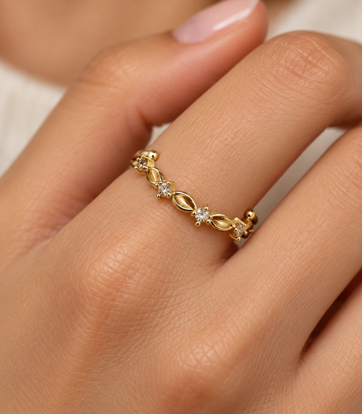 JIMIKI Gold Tone Linked Leaf Crystal Ring in Gold Tone - close-up details #color_gold-tone