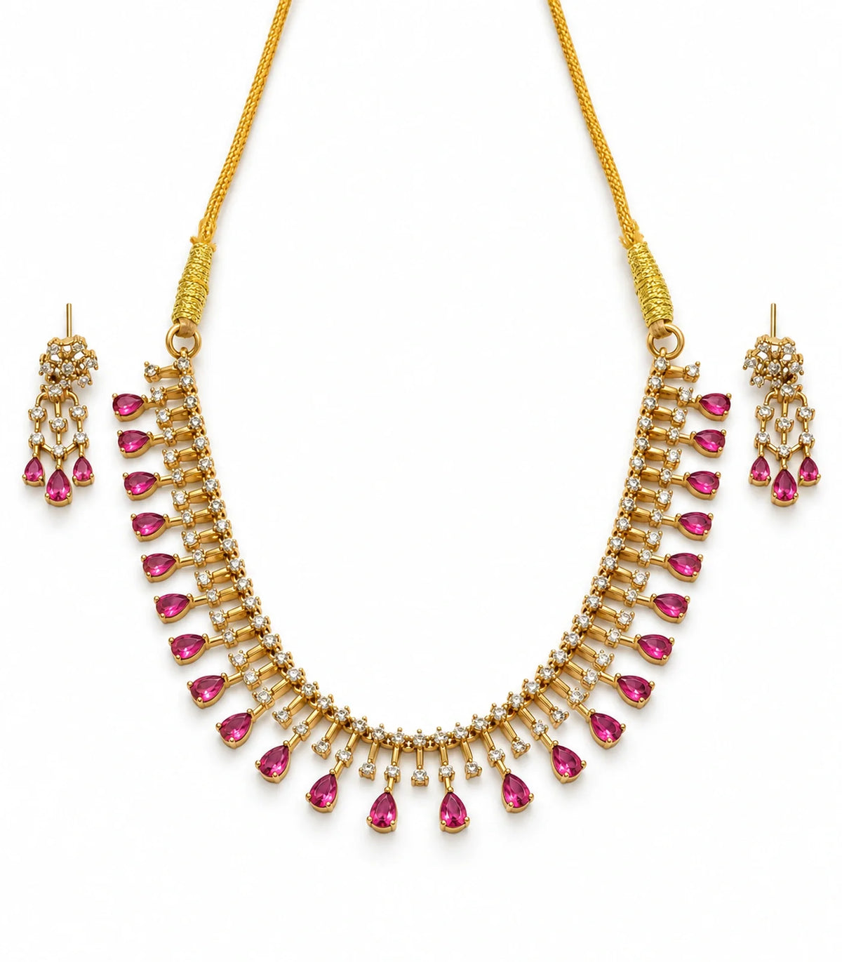 Gold-tone necklace and matching pair of earrings with magenta teardrop accents on white #Color_Magenta