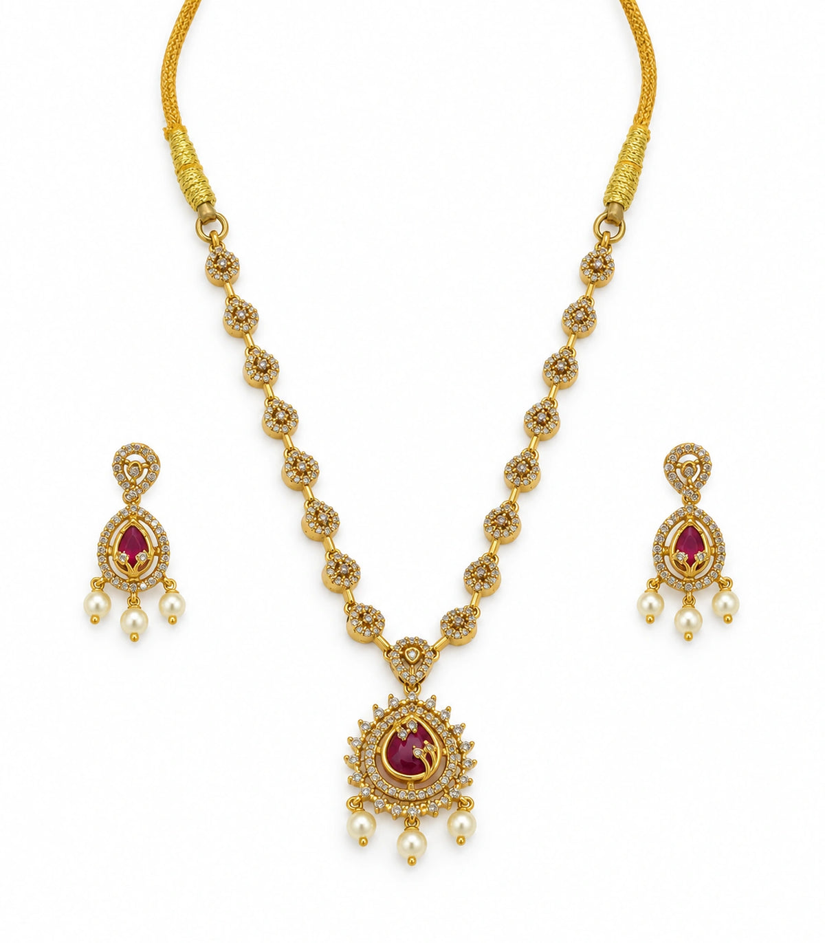 Magenta teardrop pendant necklace and matching pearl-style drop earrings on a white background