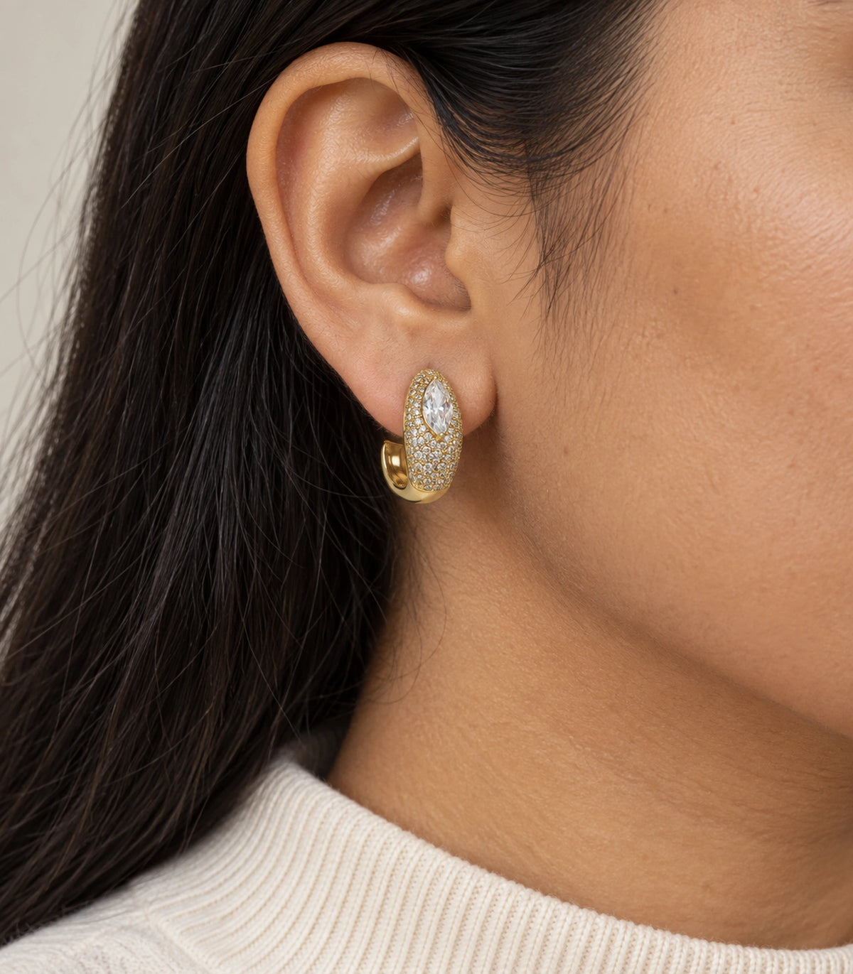 JIMIKI marquise pave open hoop earring pair in gold tone worn on a model #color_gold tone