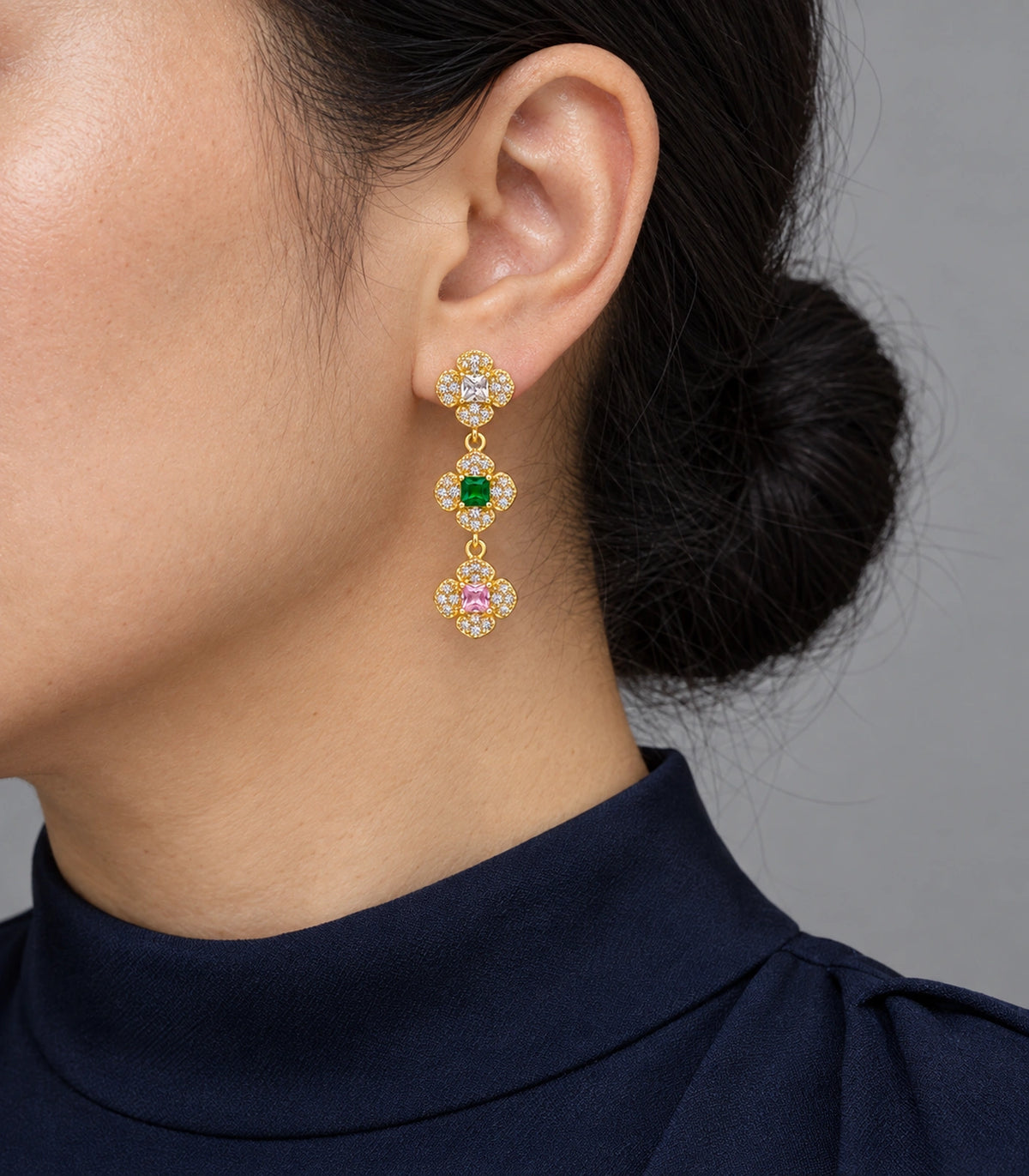 JIMIKI Triple Four Petal Flower Drop Earring Pair in Gold tone / multicolour, model wearing view #color_gold tone / multicolour