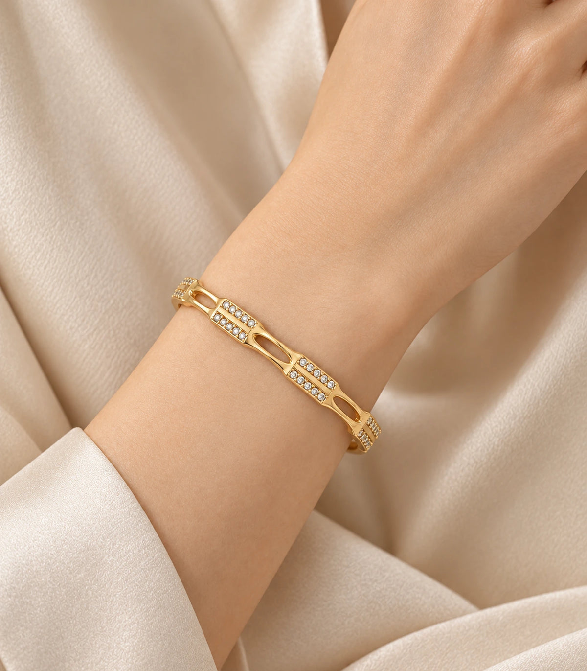 JIMIKI Gold-Tone Open Link Double Row Crystal Bangle — bangle styled with an outfit #color_gold-tone / clear
