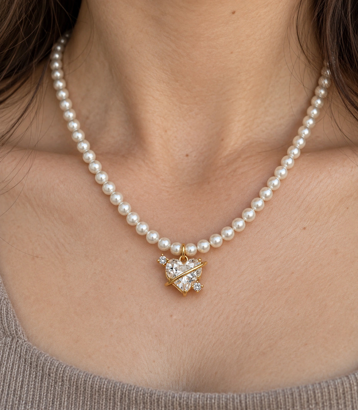 JIMIKI Gold Tone Orbit Heart Crystal Pearl Style Necklace in Gold tone / white, close-up detail