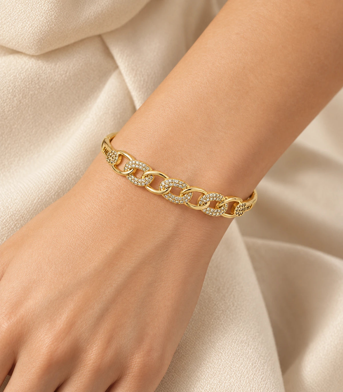 JIMIKI Gold-Tone Pavé Chain Link Bangle — bangle styled with an outfit #color_gold-tone / clear