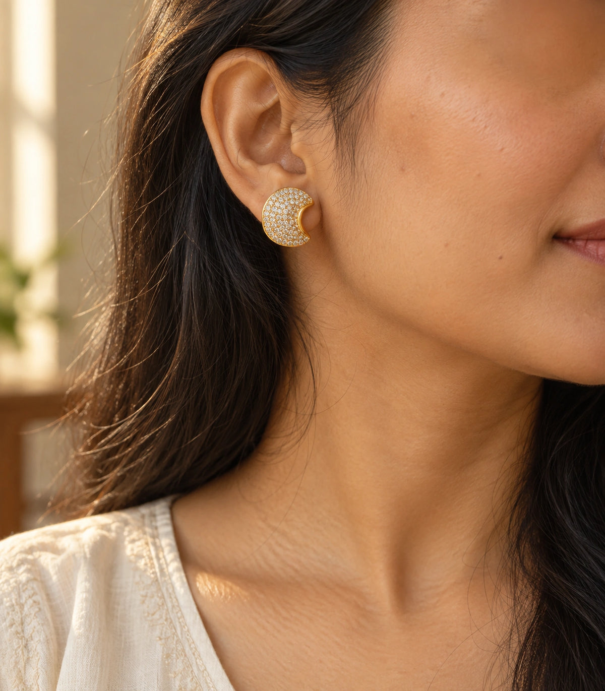 JIMIKI Pave Crescent Moon Stud Earring Pair in Gold-tone, editorial model view #color_gold-tone