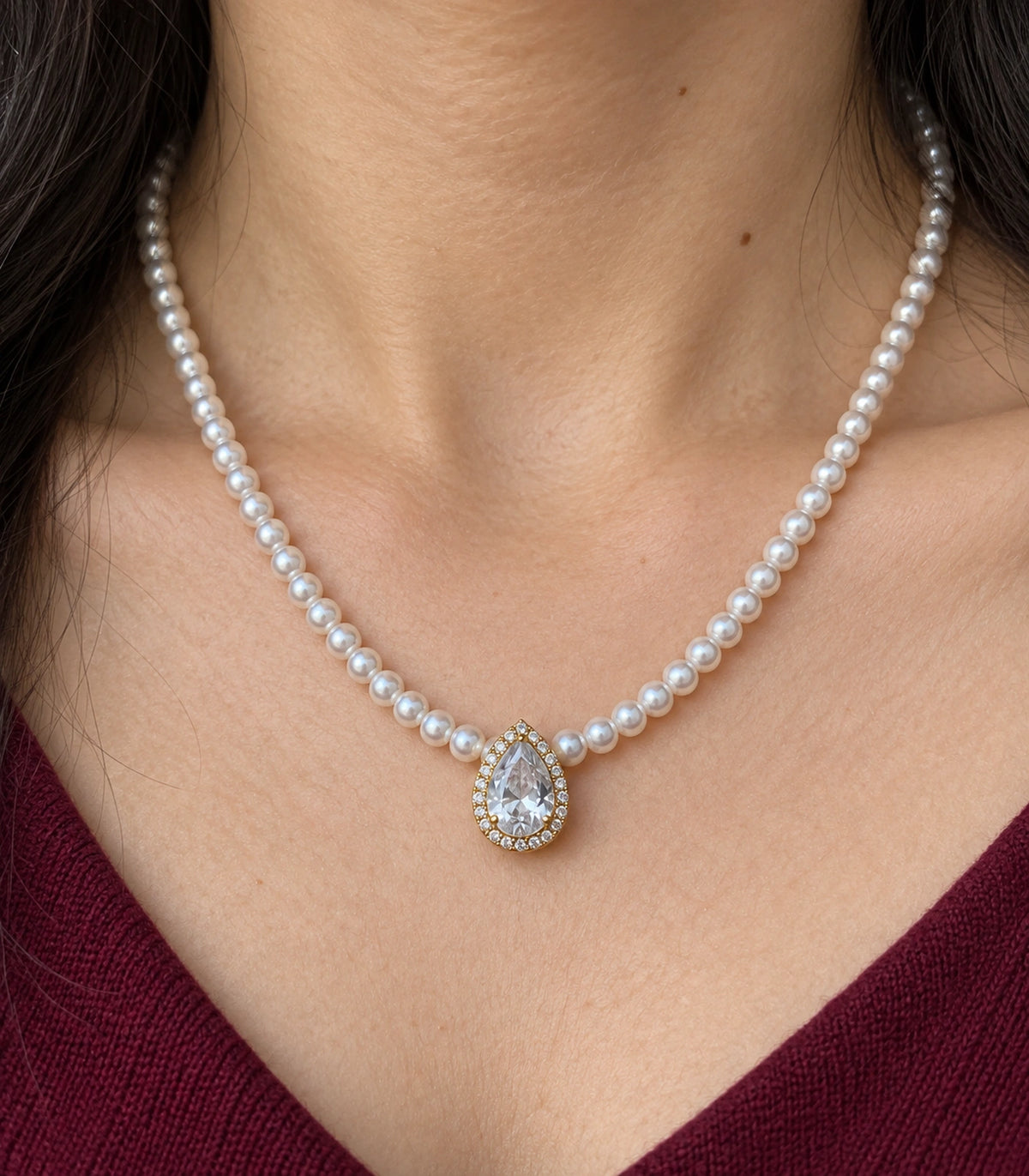 JIMIKI Gold Tone Pear Halo Crystal Pearl Style Necklace in Gold tone / white, close-up detail