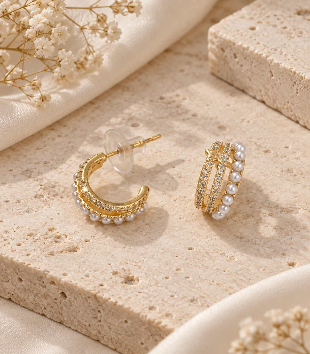 JIMIKI Gold Tone Pearl and Crystal Rail Hoop Earrings in Gold Tone - editorial flatlay #color_gold-tone