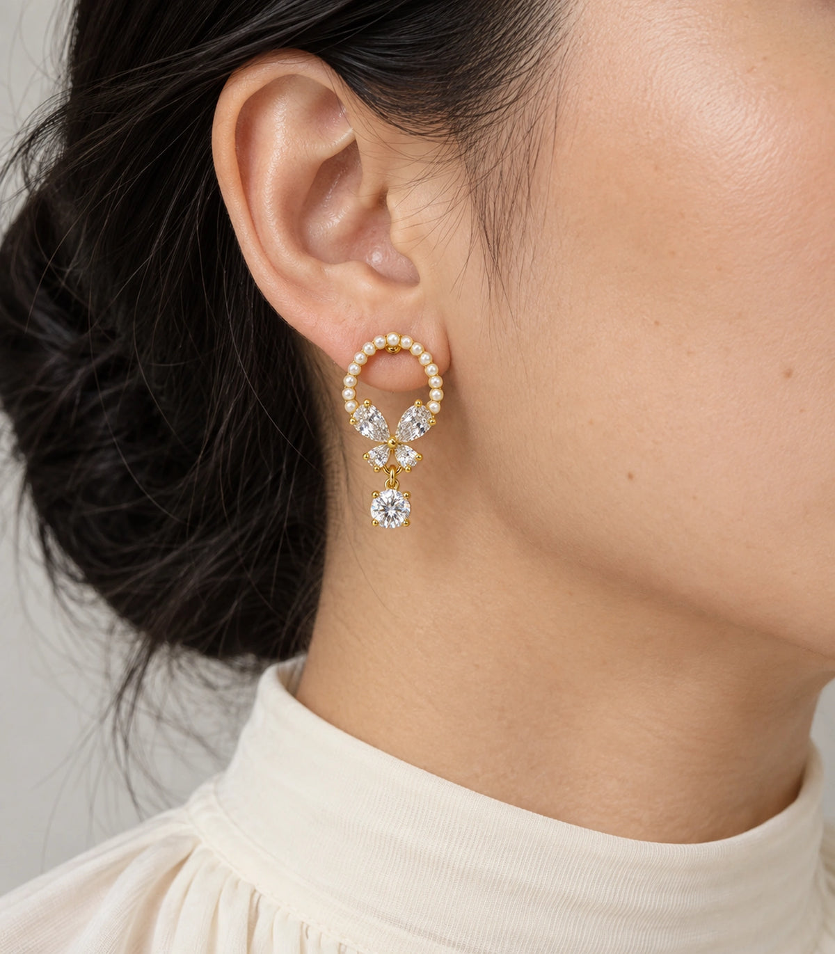 JIMIKI Gold Tone Pearl Loop Crystal Butterfly Drop Earring Pair in Gold-tone, model wearing view
