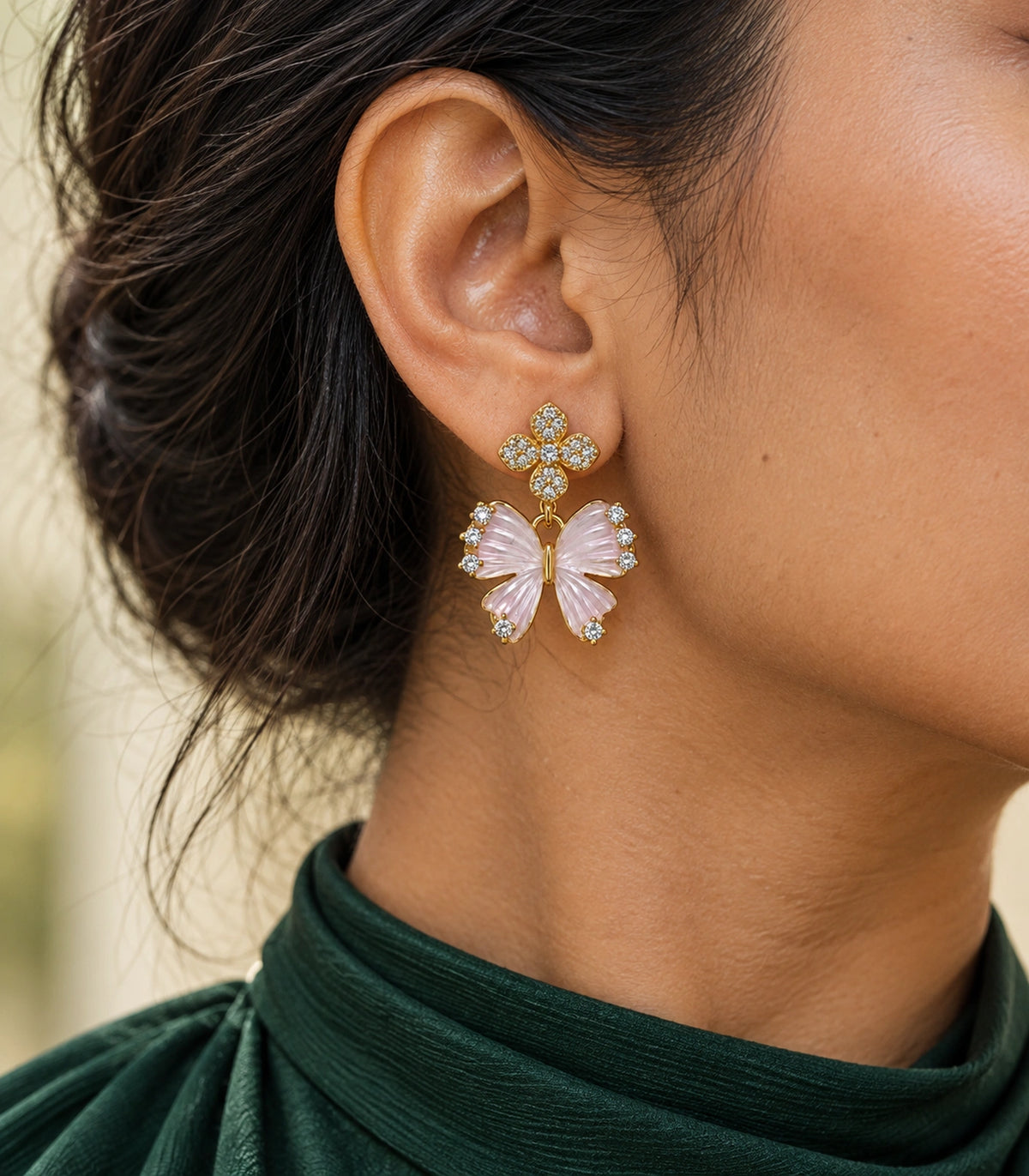 JIMIKI Butterfly Crystal Flower Drop Earring Pair in Gold tone/Pink, editorial model view #color_gold tone/pink