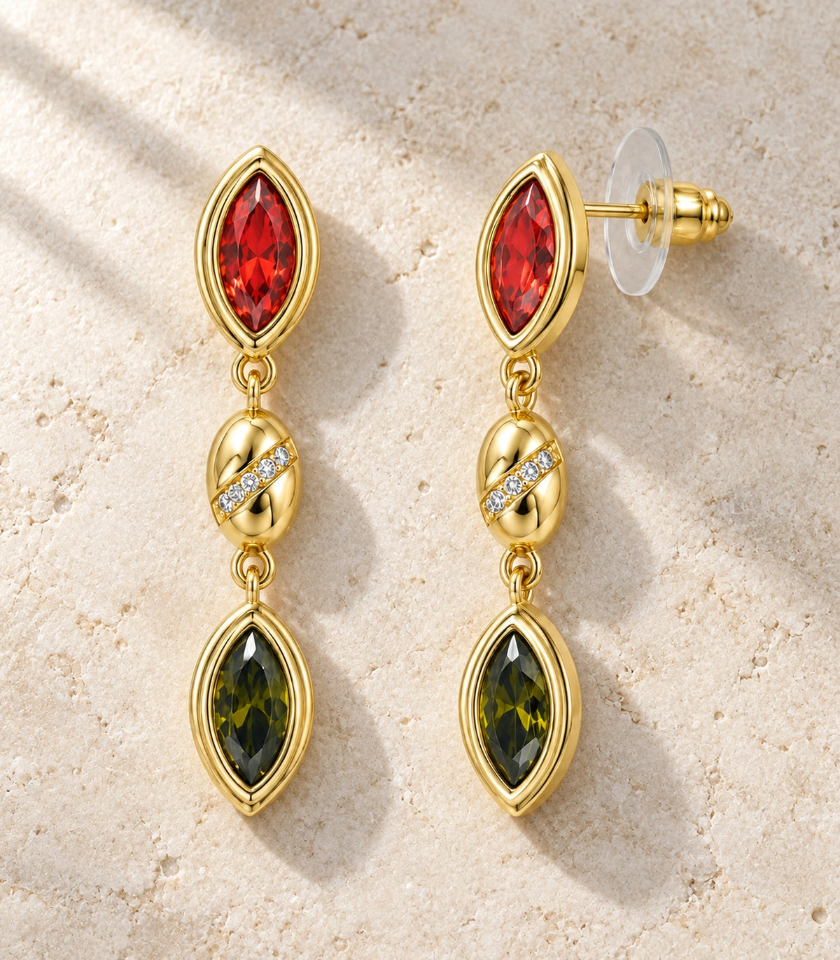 JIMIKI Marquise Crystal Oval Link Drop Earring Pair in Gold-tone / Red / Olive green, editorial flat lay #color_gold-tone / red / olive green