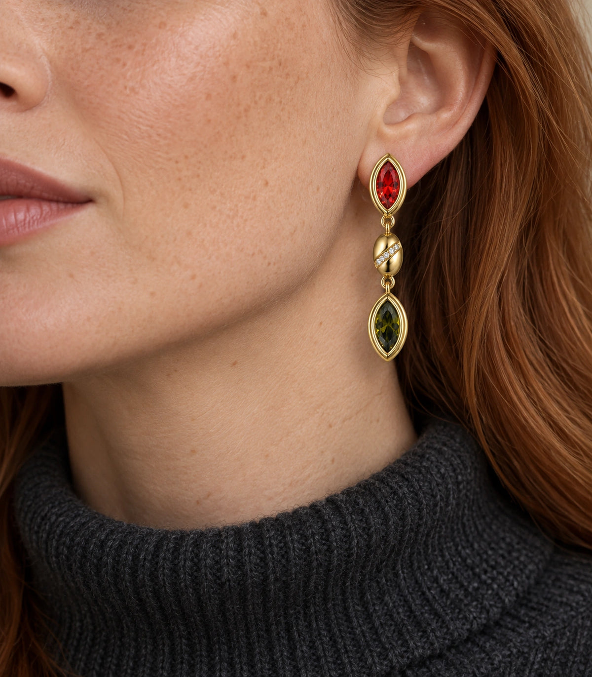 JIMIKI Marquise Crystal Oval Link Drop Earring Pair in Gold-tone / Red / Olive green, model wearing view #color_gold-tone / red / olive green
