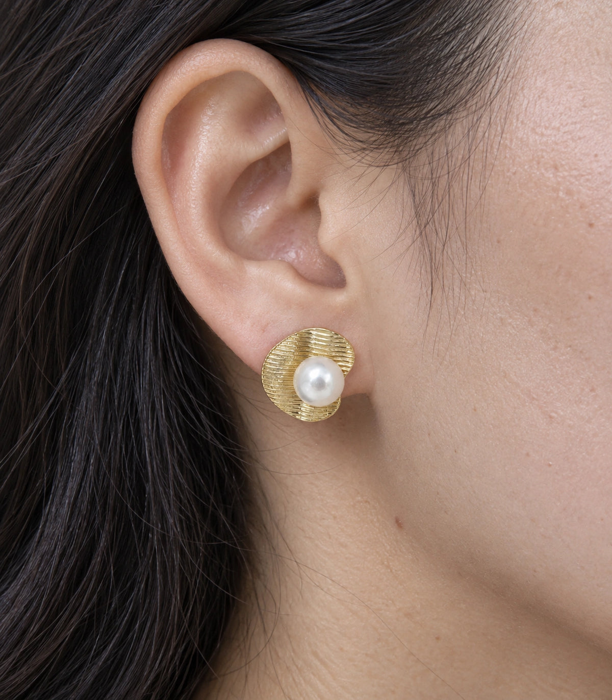 JIMIKI Ribbed Curved Disc Pearl Stud Earring Pair in Gold tone / White, close-up detail #color_gold tone / white