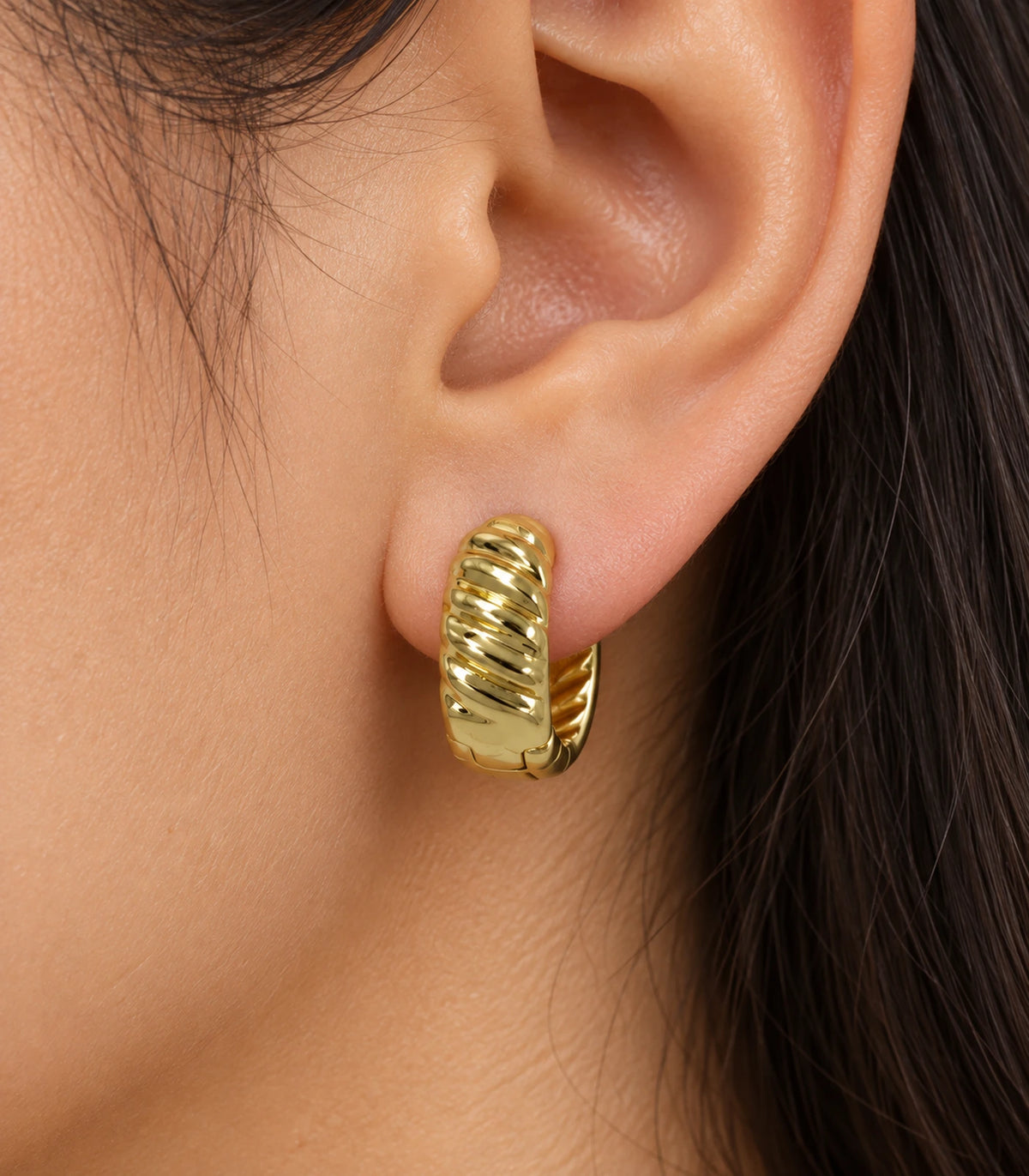 JIMIKI Gold Tone Ribbed Hoop Earrings in Gold Tone - closeup #color_gold-tone
