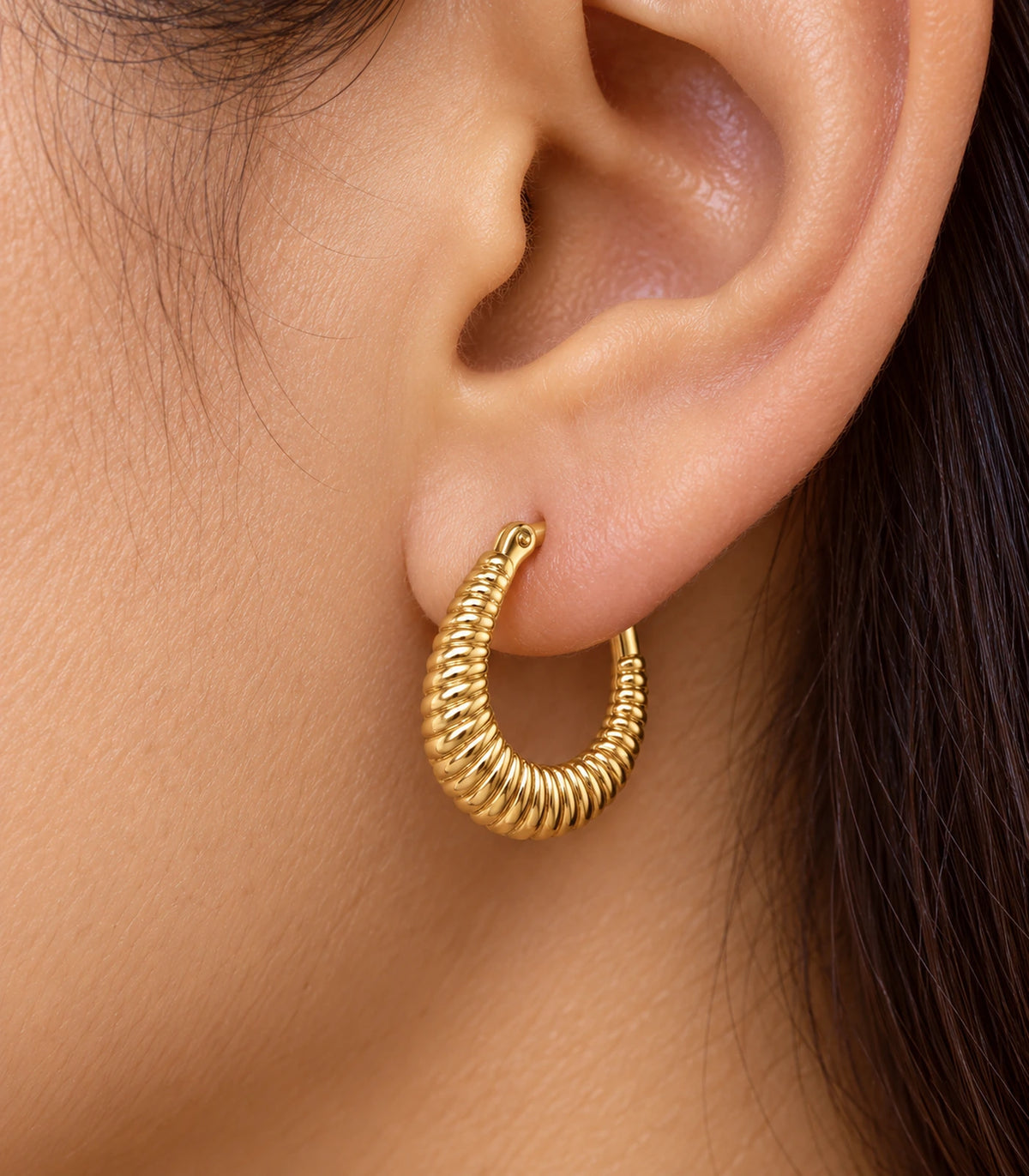 JIMIKI Ribbed Teardrop Hoop Earrings in Gold Tone - closeup #color_gold-tone