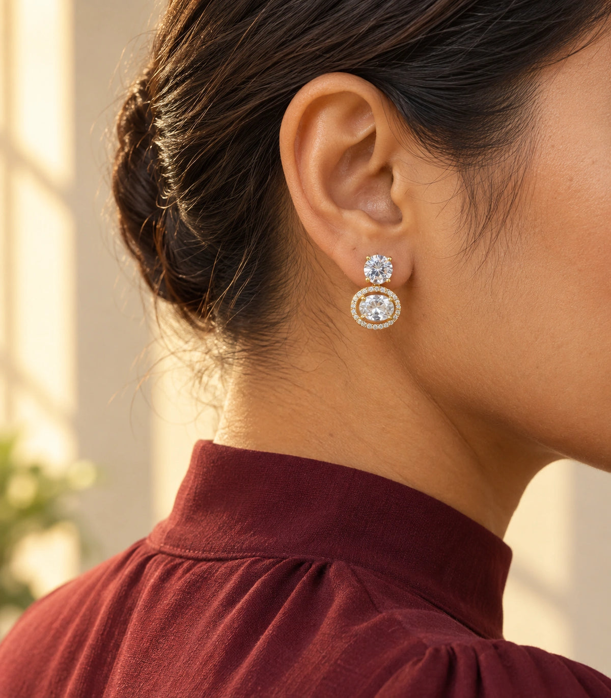 JIMIKI Gold Tone Round Crystal Halo Drop Earring Pair in Gold-tone, editorial model view