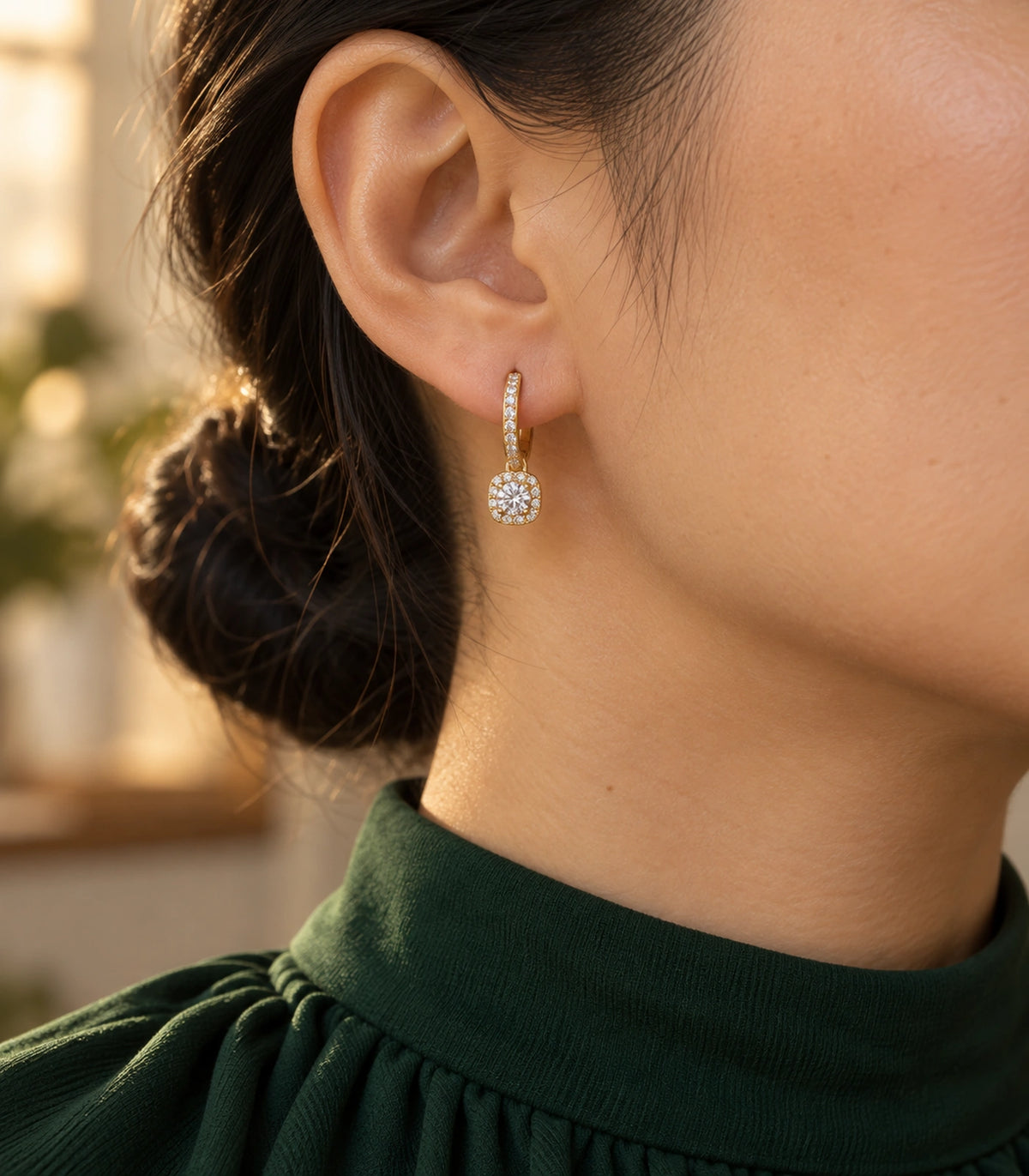 JIMIKI Gold-Tone Round Halo Solitaire Drop Huggie Earrings in Gold / Clear, editorial model view
