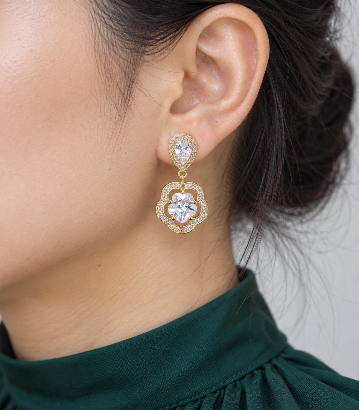 JIMIKI Teardrop Flower Crystal Drop Earring Pair in Gold-tone, close-up detail #color_gold-tone