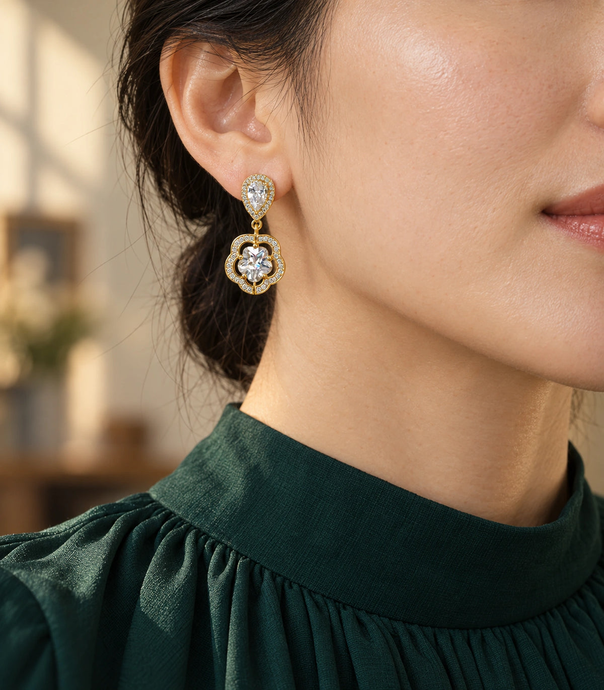 JIMIKI Teardrop Flower Crystal Drop Earring Pair in Gold-tone, editorial model view #color_gold-tone