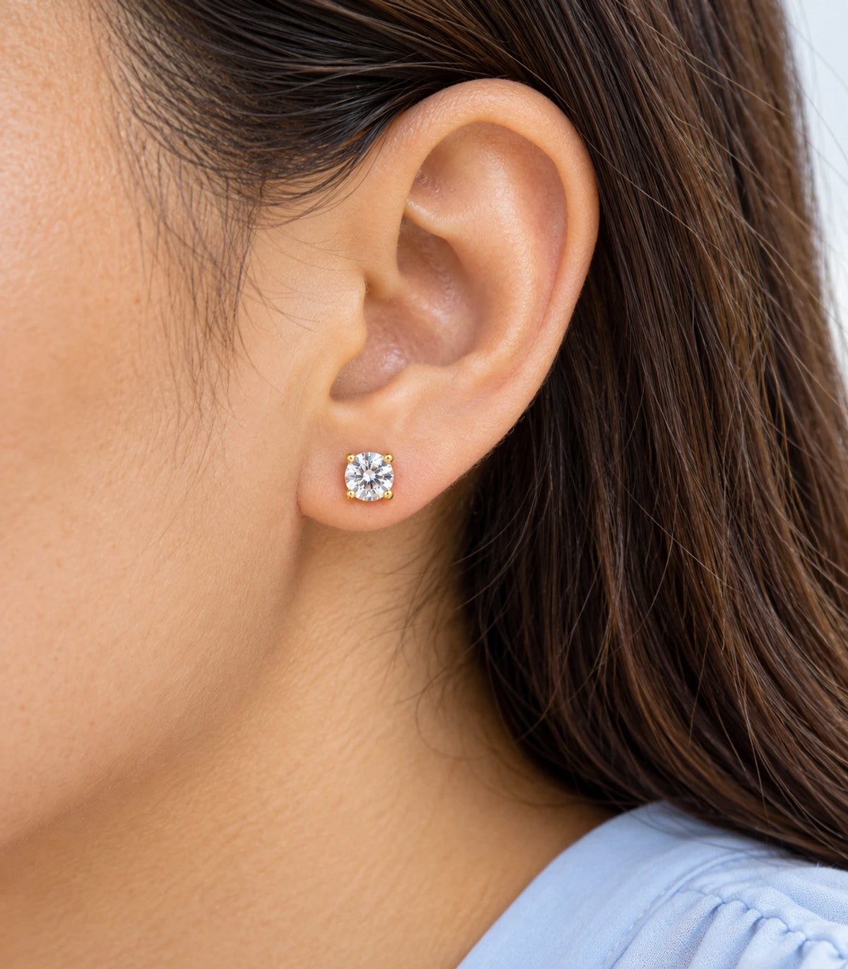Closeup of a solitaire crystal stud from the three-pair earring set