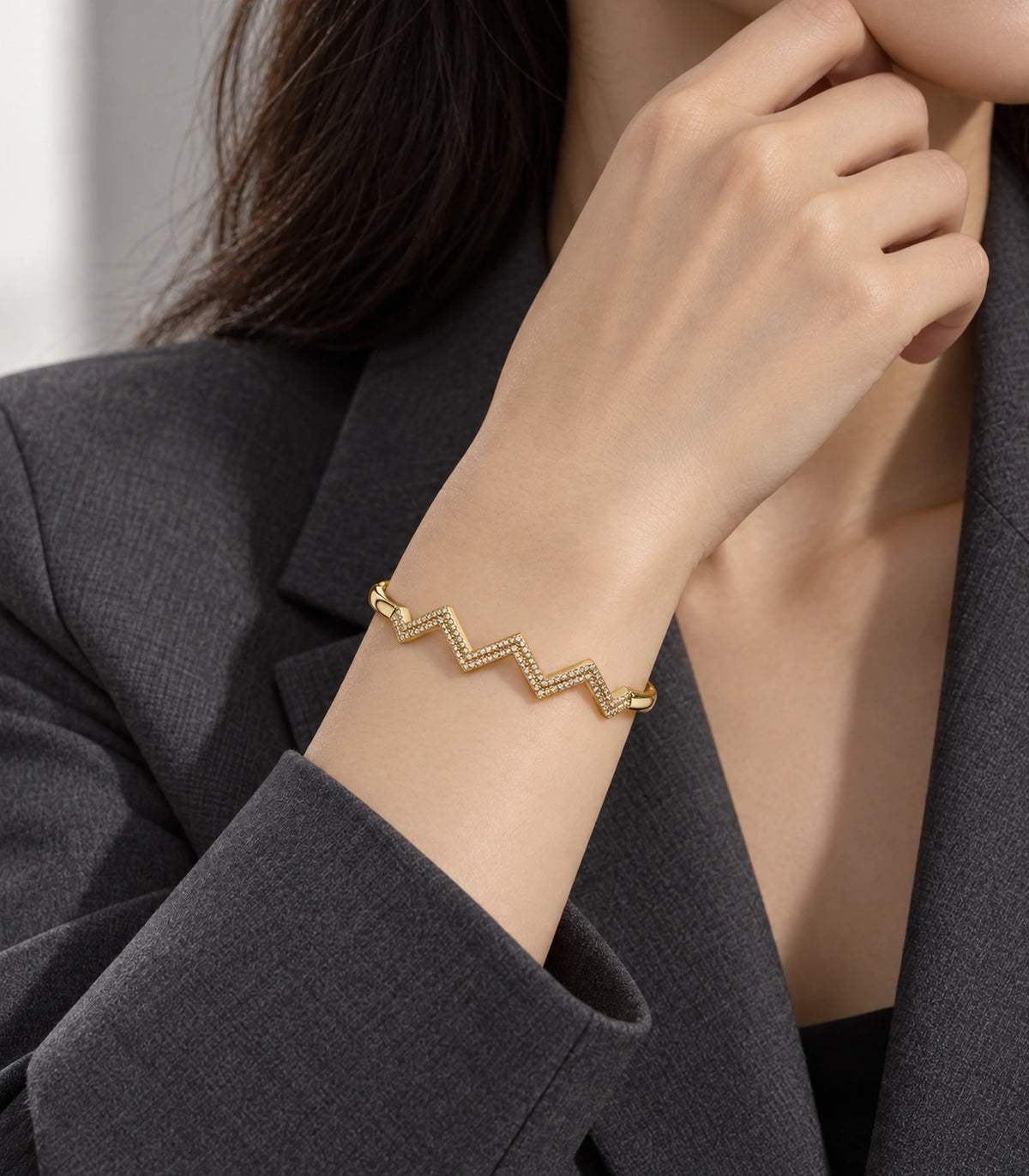 JIMIKI Gold-Tone Triple Chevron Pavé Bangle — bangle styled with an outfit #color_gold-tone / clear