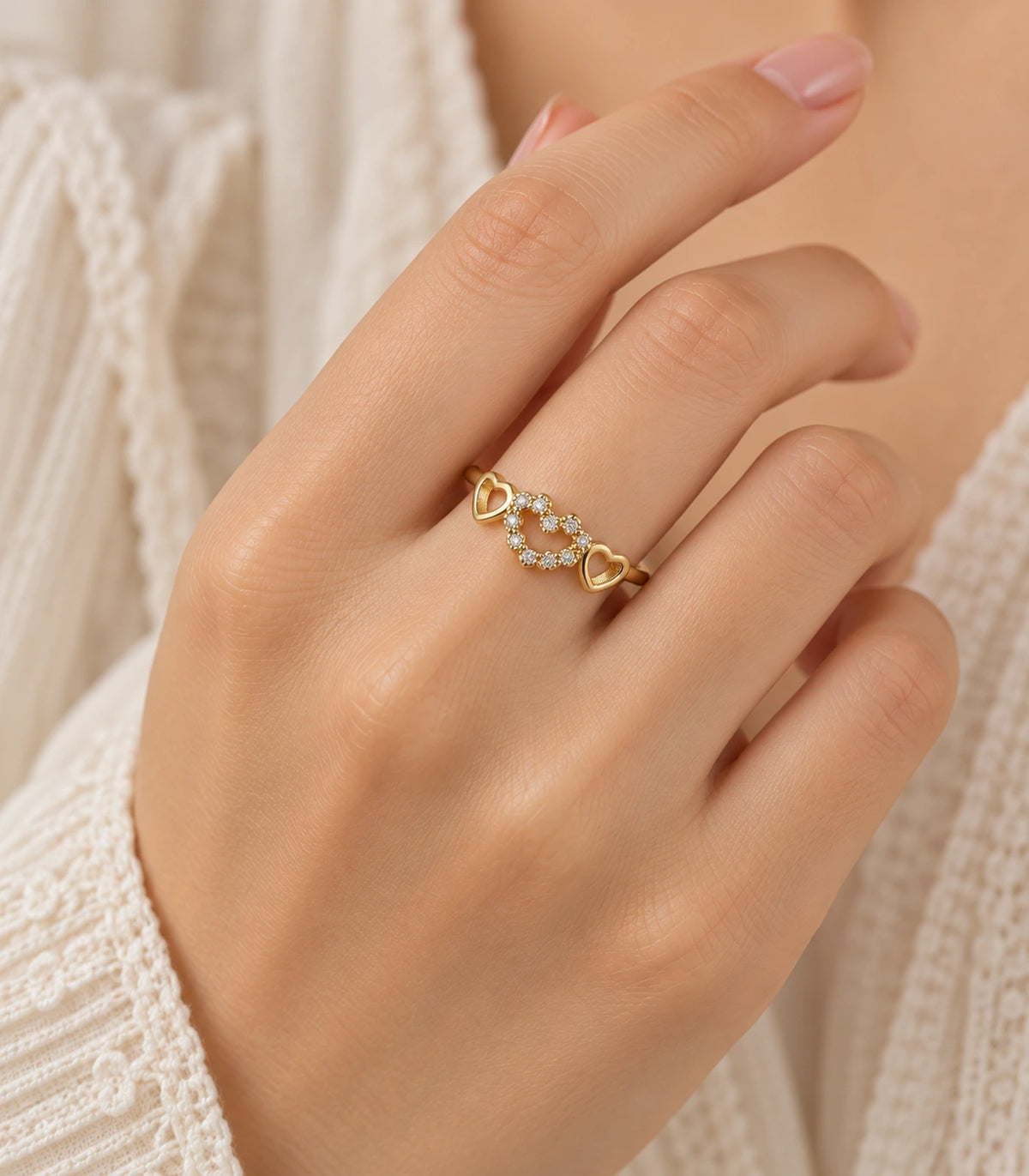 JIMIKI Triple Heart Crystal Adjustable Ring in Gold Tone - worn styling view #color_gold-tone