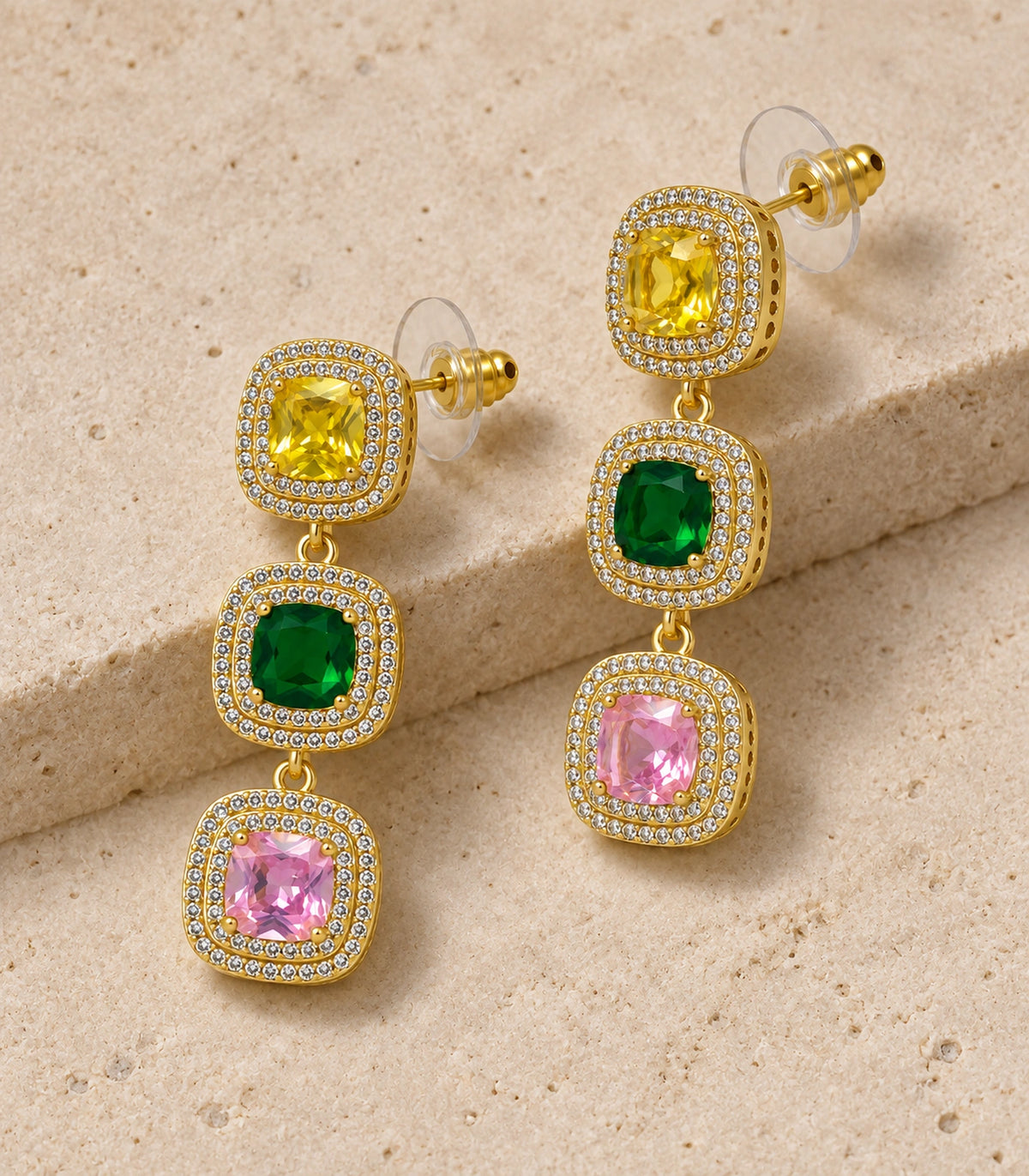JIMIKI Yellow Green Pink Triple Cushion Halo Drop Earring Pair in Gold tone / yellow, green, pink, editorial flat lay #color_gold tone / yellow, green, pink