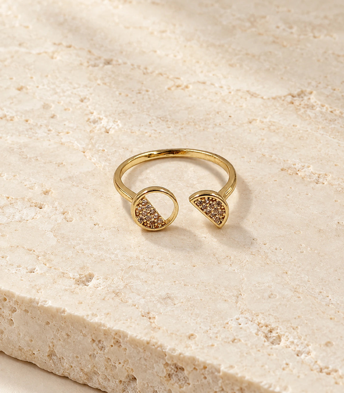 Gold Two-Shape Pavé Open Ring on a textured stone surface
