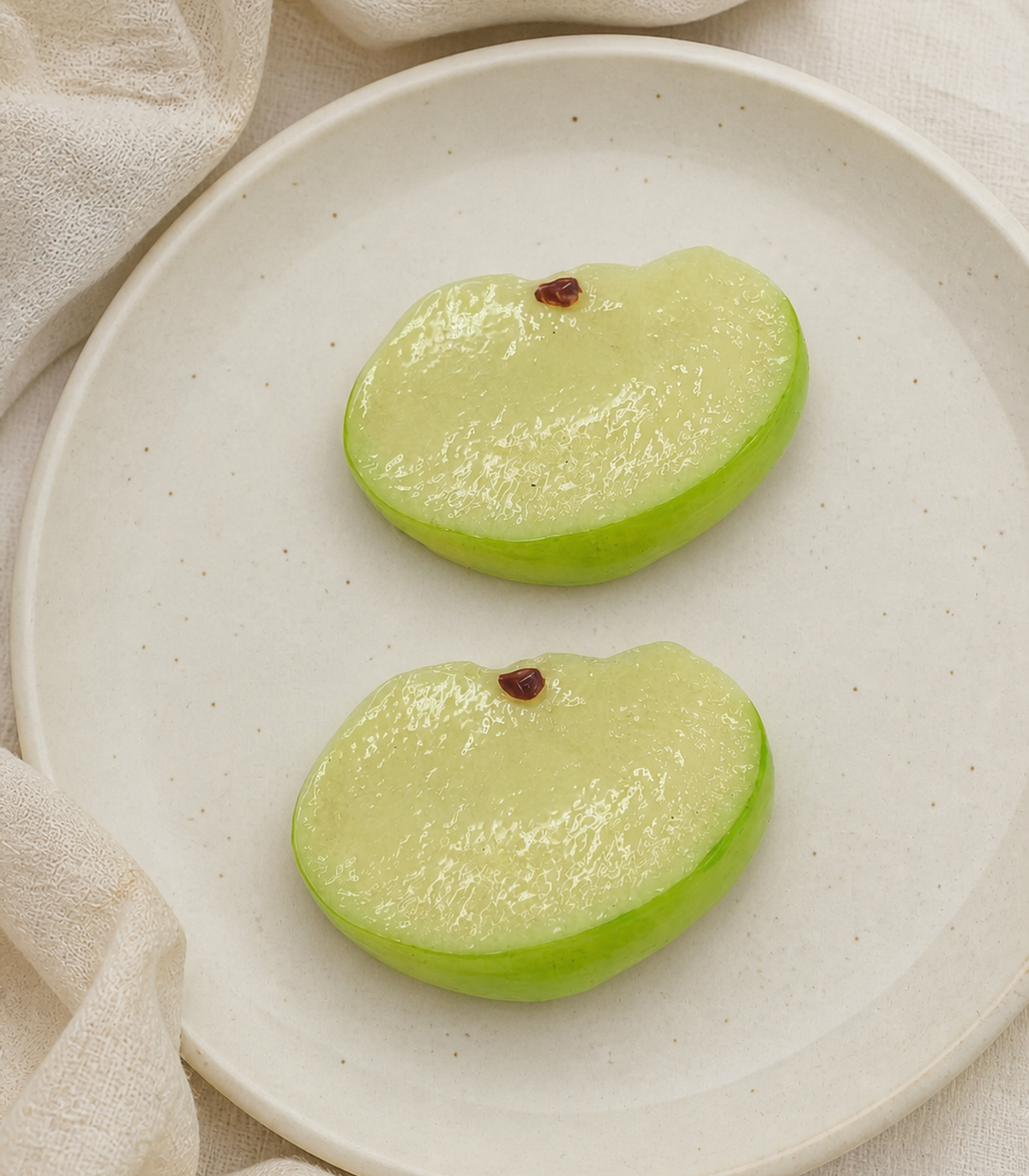 Green Apple Barrette Pair editorial flat lay