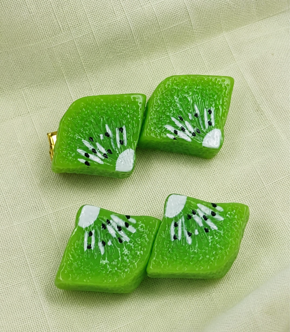 Green Kiwi Duo Clip Pair in close-up detail
