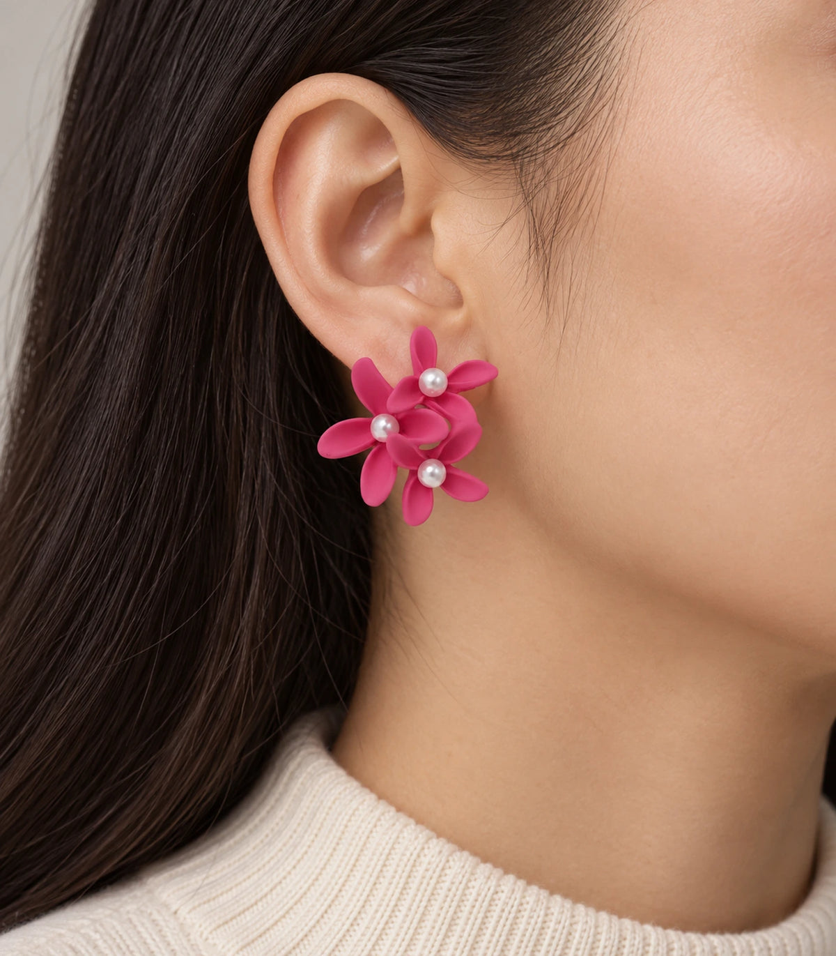 JIMIKI Hot Pink cascading floral cluster stud earrings, worn on the ear with the floral cluster visible #color_hot pink