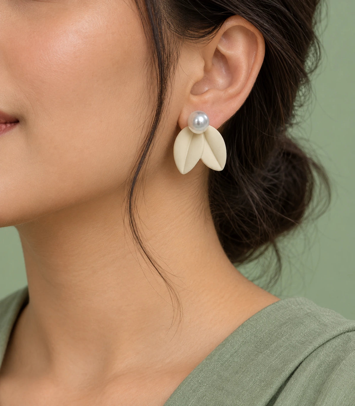JIMIKI Double Leaf Pearl Stud Earrings in Ivory — earrings worn on the ear #color_ivory