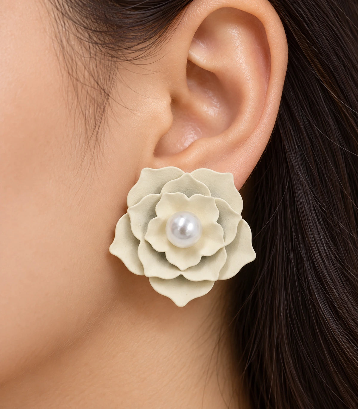 JIMIKI Layered Flower Pearl Stud Earrings, Ivory — worn close-up showing petal detail #color_ivory