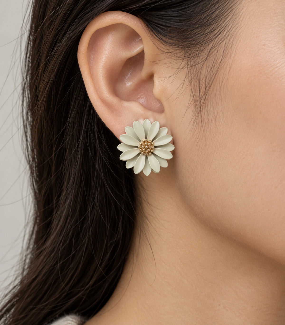 JIMIKI Ivory layered starburst daisy stud earrings, layered daisy stud worn at the ear #color_ivory