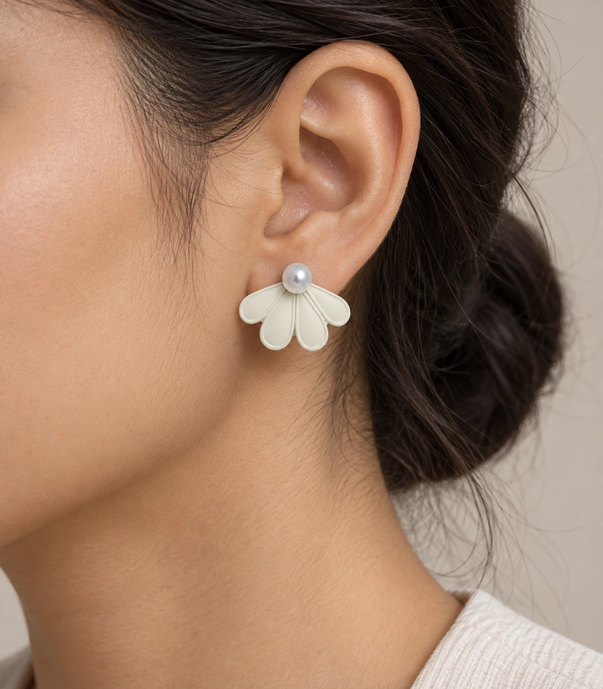 JIMIKI Ivory pearl fan petal stud earrings, naturally worn on the ear #color_ivory