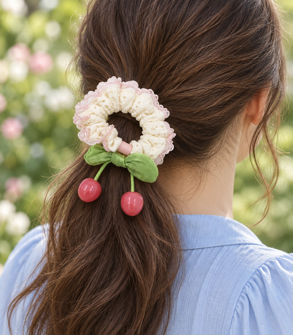 JIMIKI Ivory Pink-Trim Lace Cherry Scrunchie in Ivory/Pink/Green, editorial model view