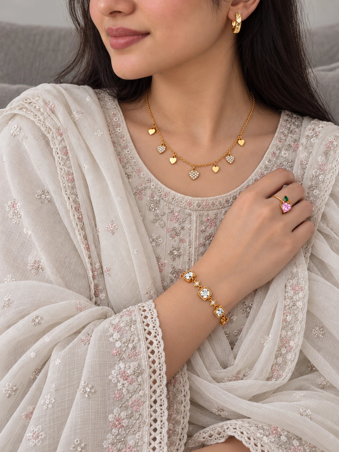 Shop All — ivory embroidered styling with gold heart necklace, earrings, ring and crystal bracelet