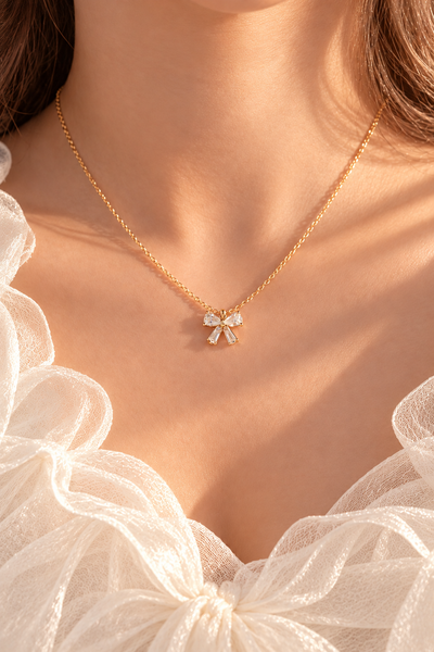 Golden bow necklace