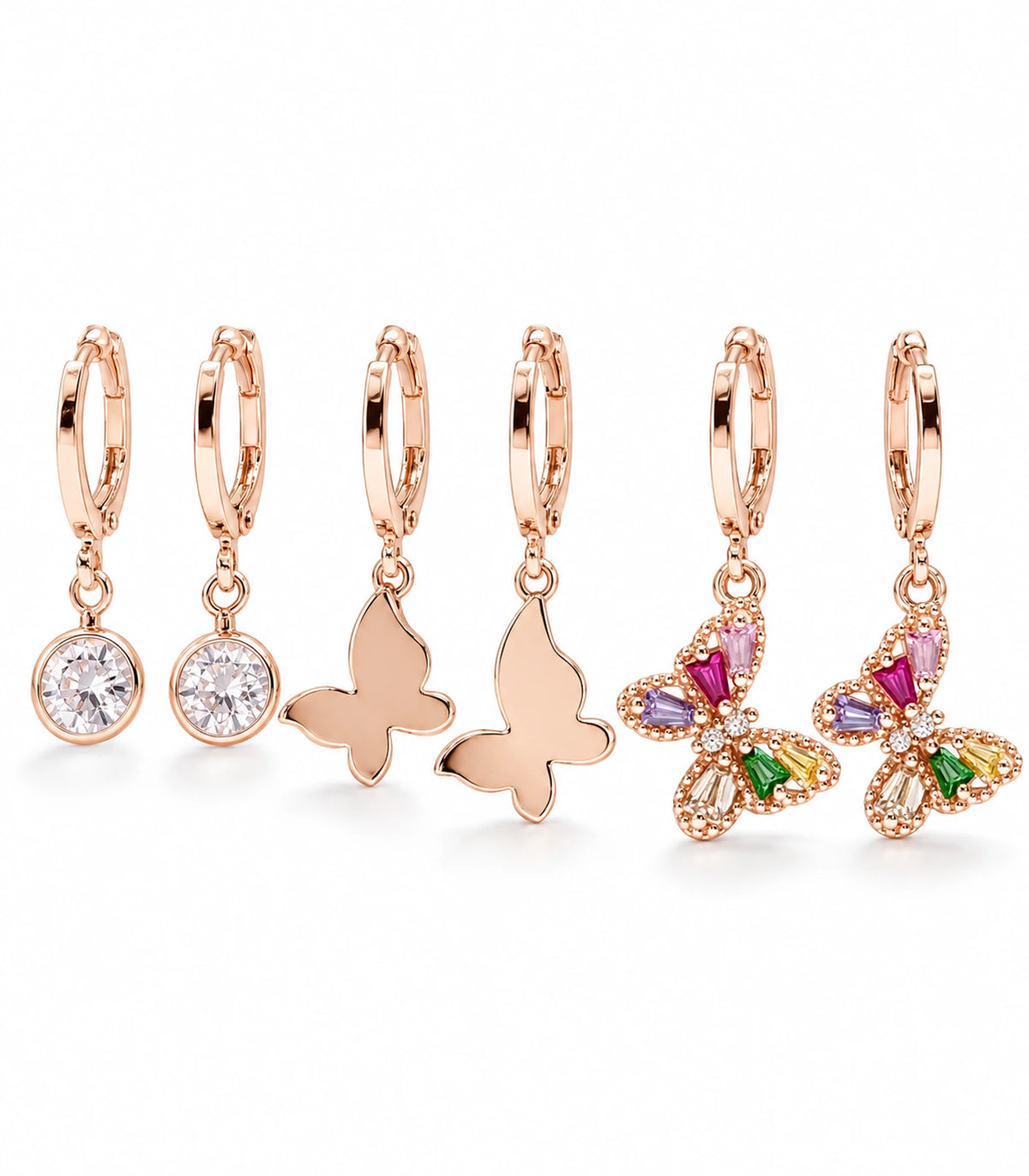 Rose gold tone three-pair hoop earring set: clear crystals, smooth butterflies and multicolour crystal butterflies; six earrings