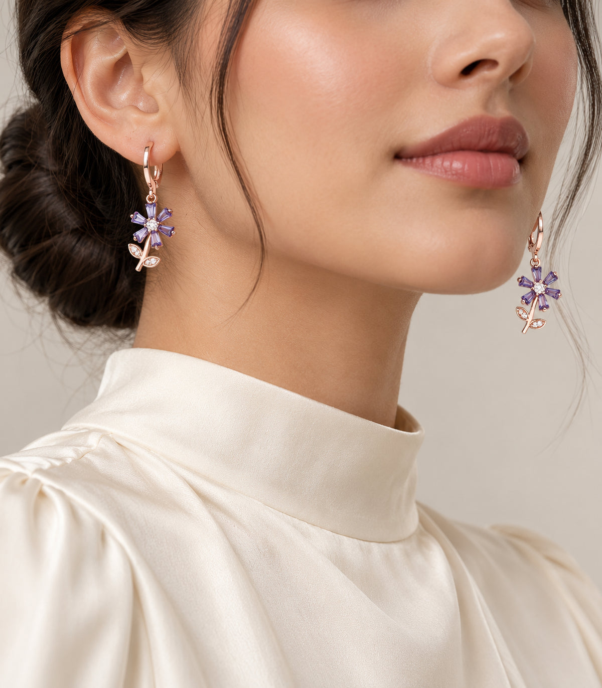 JIMIKI rose gold tone three-pair ball, crystal and purple flower hoop earring set — model