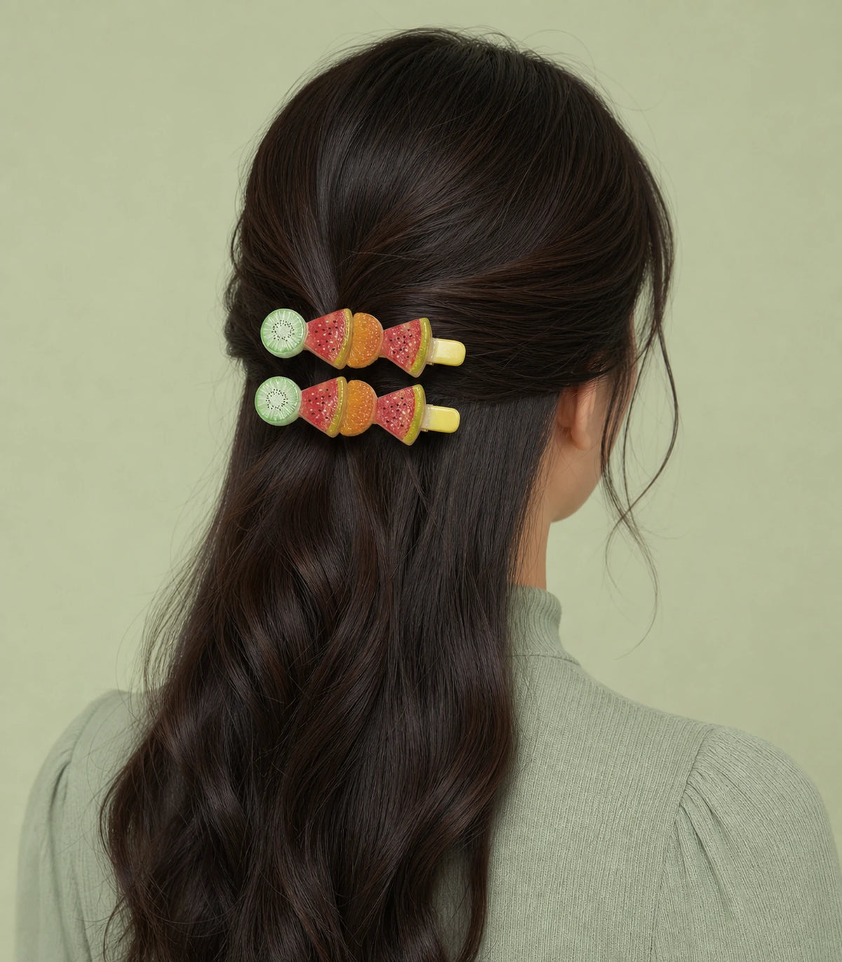 Model wearing the Kiwi Watermelon Orange Fruit Barrette Pair
