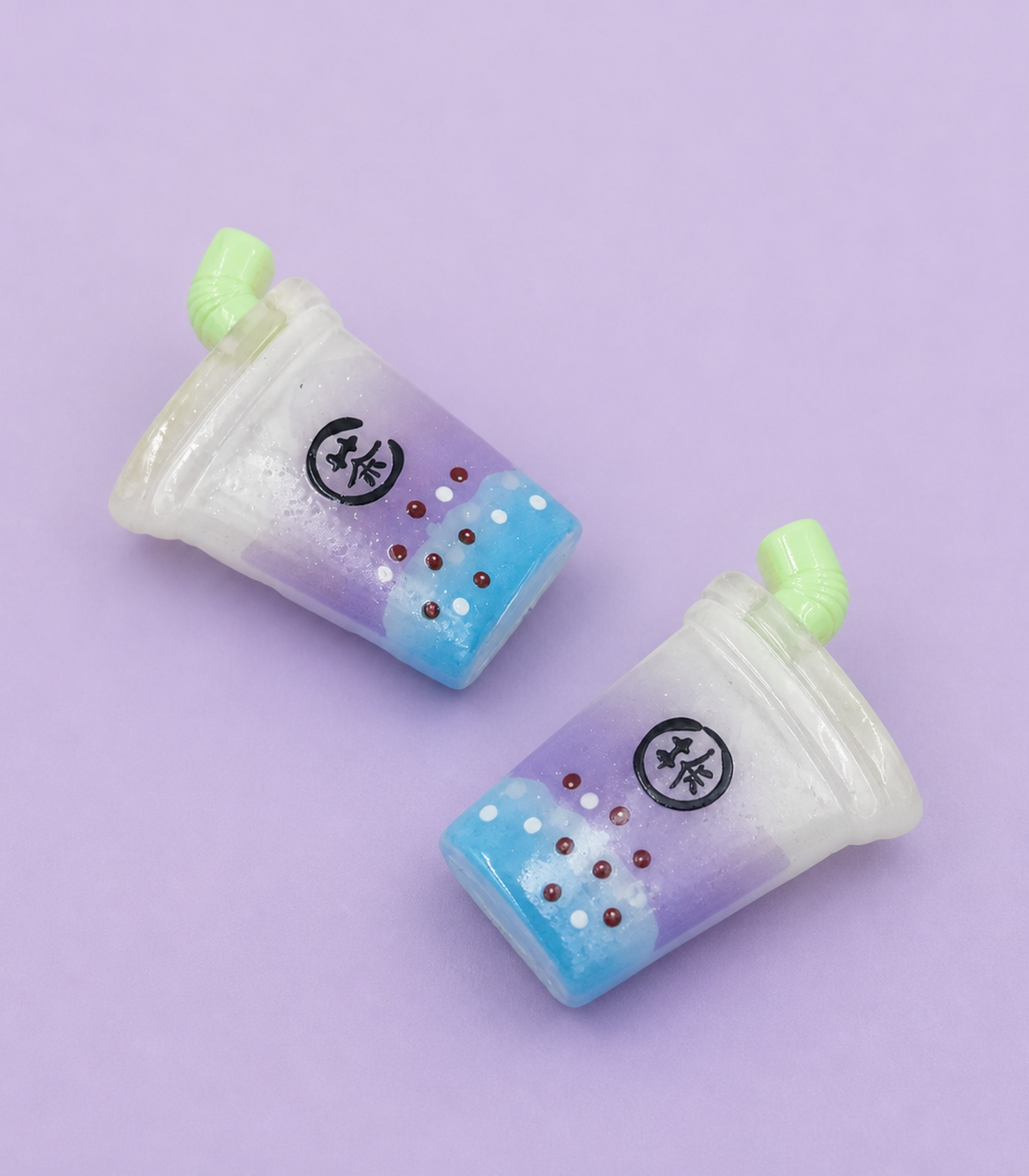 Lavender Blue Drink Barrette Pair editorial flat lay