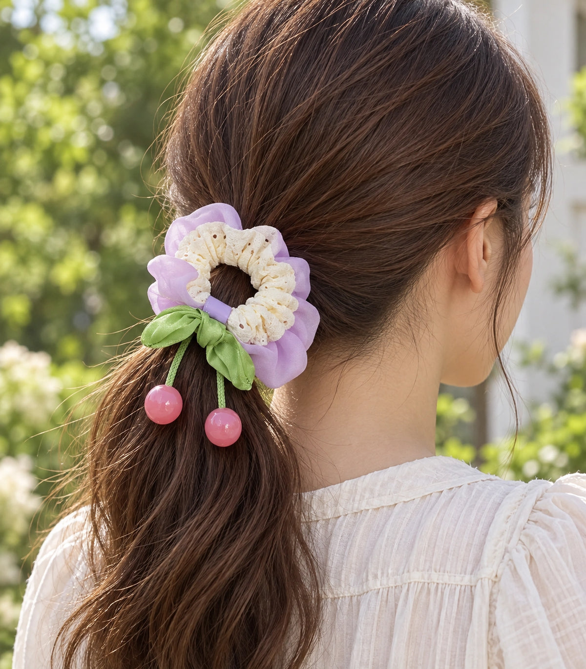 JIMIKI Lace Scrunchie With Cherry Charms in Lavender, editorial model view #color_lavender