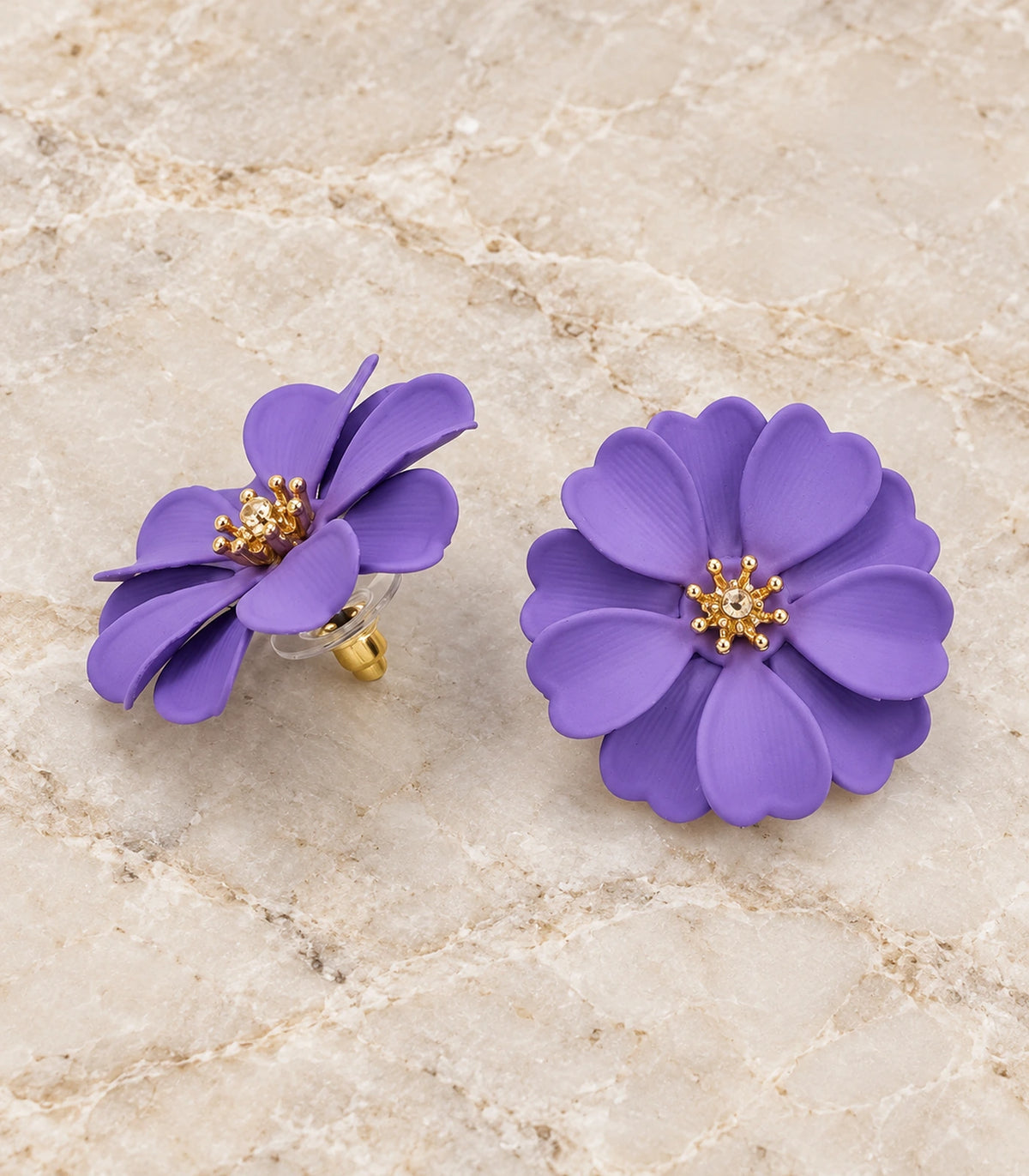 JIMIKI Lavender Layered Daisy Stud Earrings - pair in styled flatlay #color_lavender