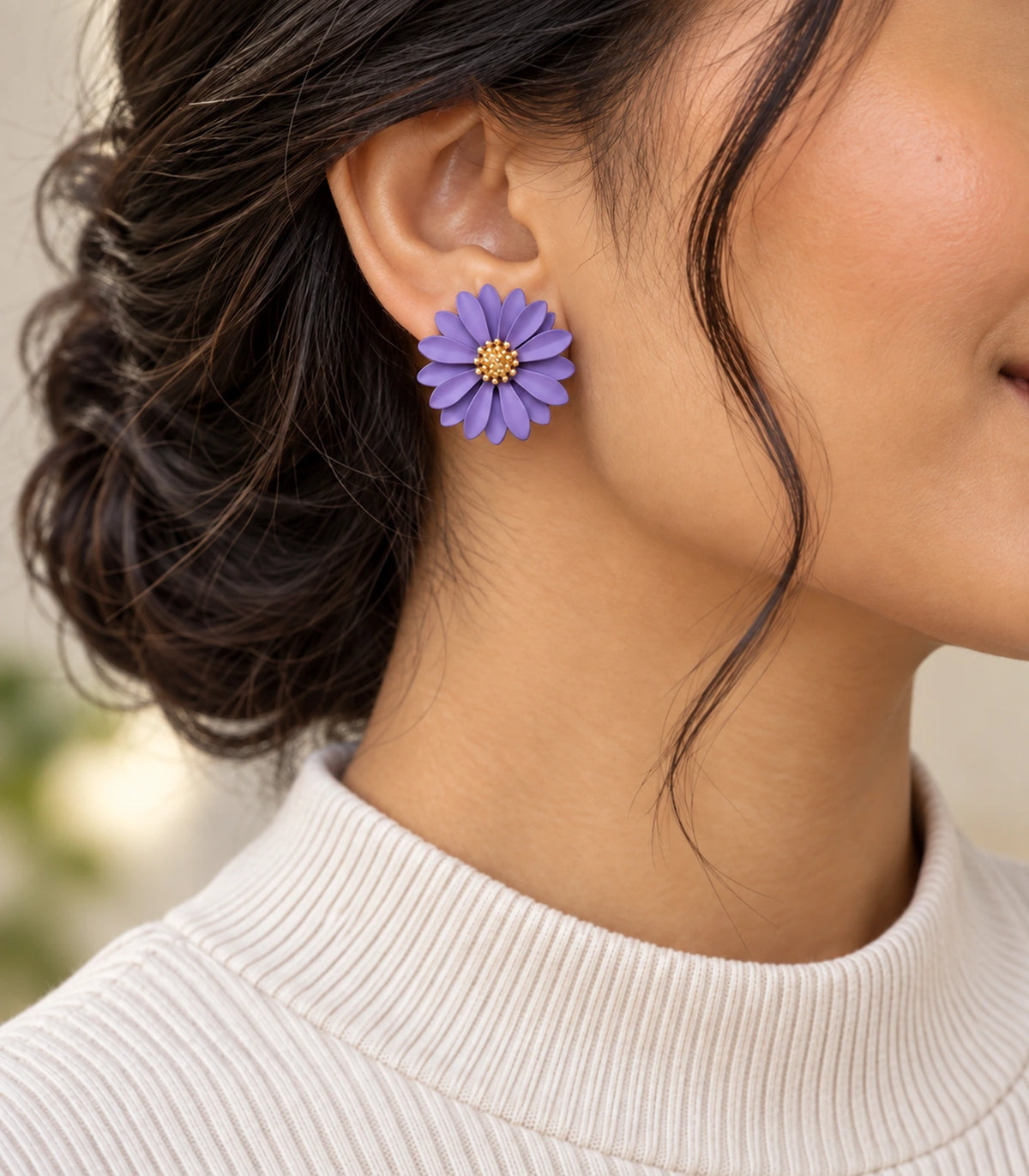 JIMIKI Lavender layered starburst daisy stud earrings, editorial portrait of the daisy stud worn at the ear #color_lavender