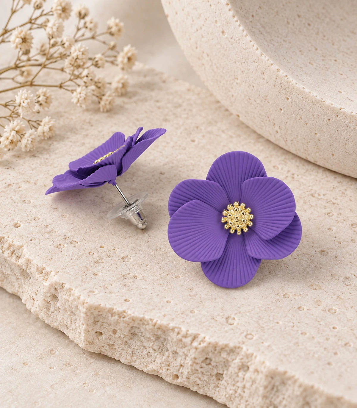 JIMIKI Lavender ribbed flower stud earrings, pair arranged in an editorial flat lay #color_lavender