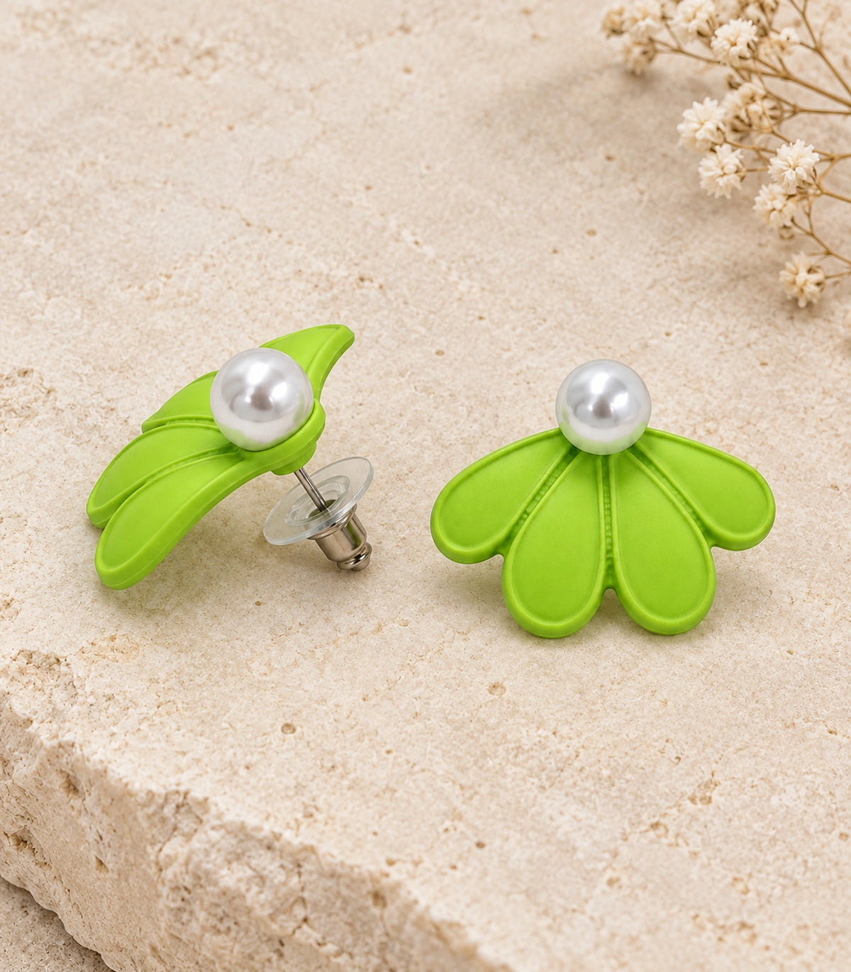 JIMIKI Lime pearl fan petal stud earrings, pair in an editorial flat lay #color_lime