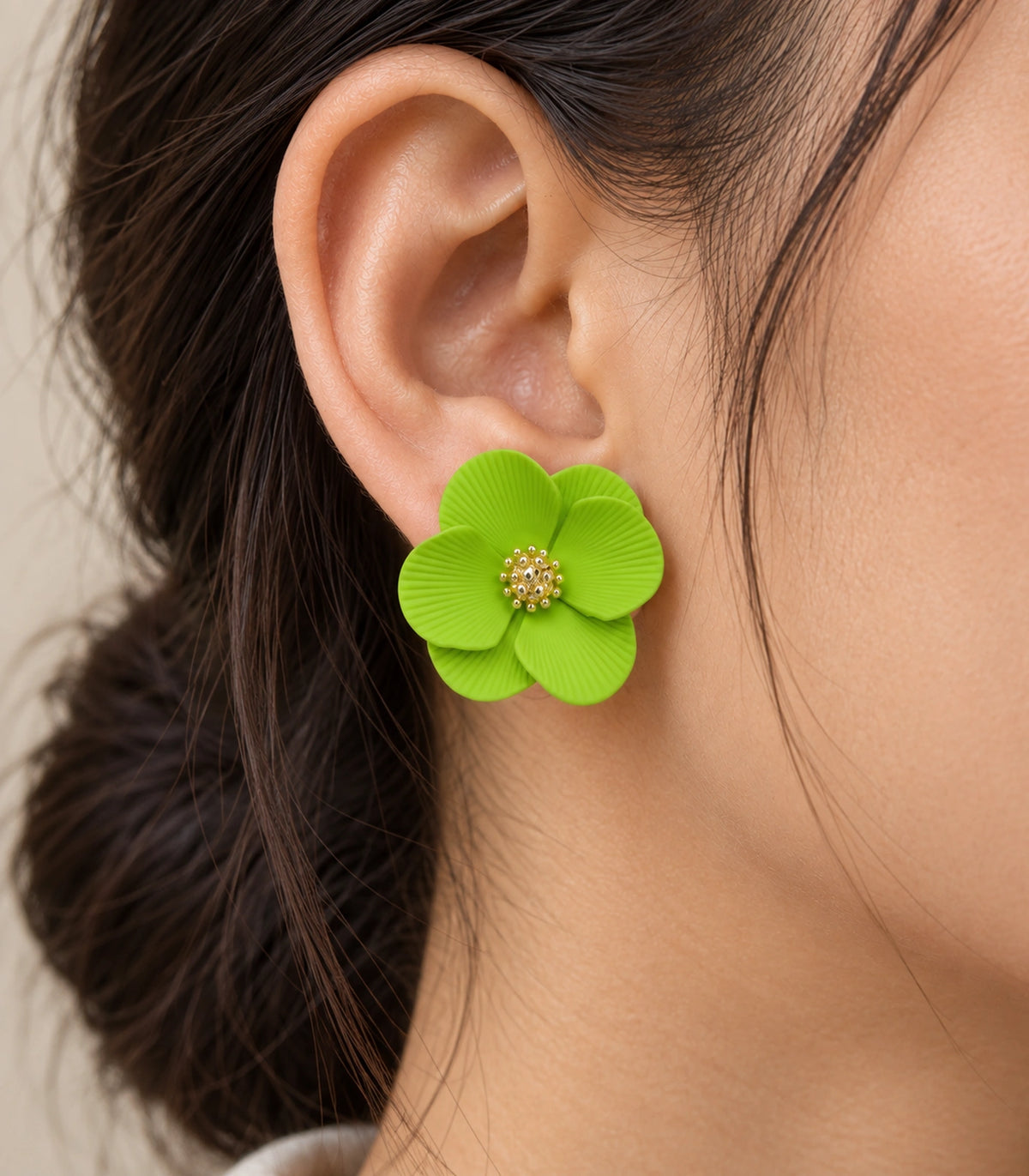 JIMIKI Lime ribbed flower stud earrings, worn closeup of ribbed petals and gold-tone centre #color_lime