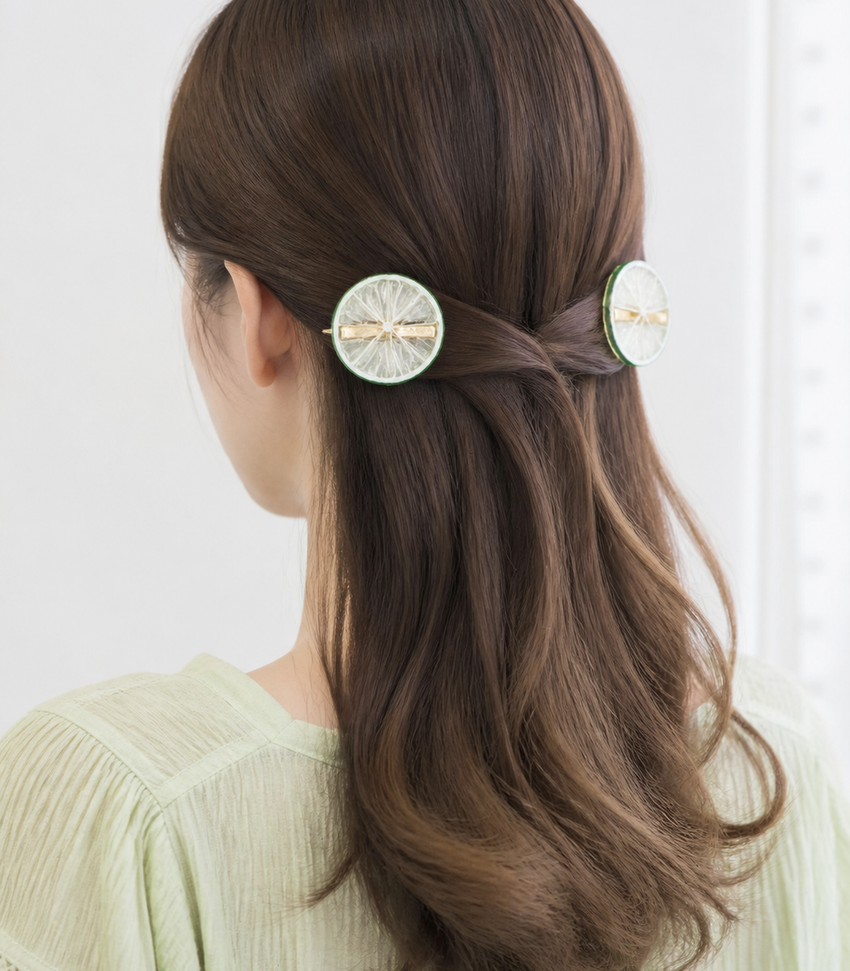 JIMIKI Translucent Lime Slice Barrette Pair in Clear / Green, worn hairstyle view